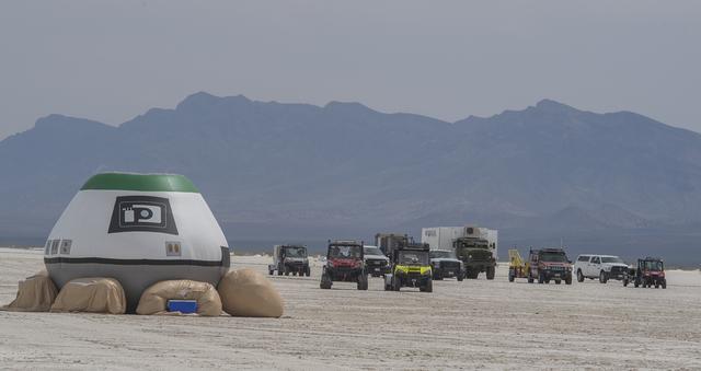 Boeing, NASA and U.S. Army teams rehearse safely bringing the CST-100 Starliner spacecraft home to Earth on Wed., June 6, 2018, at the U.S. Army's White Sands Missile Range in New Mexico. During the detailed landing simulation, engineers, technicians and spaceflight specialists worked through tight timelines and intense heat running through simulations of the spacecraft's landing and recovery, an operation that will cap each Starliner mission. For flight controllers at Mission Control in Houston, the simulation offered the chance to evaluate their own processes and rehearse everything from undocking the Starliner from the space station to communicating with the recovery teams in the field.