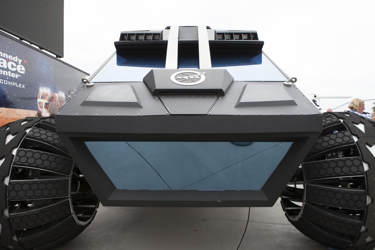 The scientifically-themed Mars rover concept vehicle operates on an electric motor, powered by solar panels and a 700-volt battery. The back section opens and serves as a laboratory which can disconnect for autonomous research. While this exact rover is not expected to operate on Mars, one or more of its elements could make its way into a rover astronauts will drive on the Red Planet. The "Summer of Mars" promotion is designed to provide guests with a better understanding of NASA's studies of the Red Planet. The builders of the rover, Parker Brothers Concepts of Port Canaveral, Florida, incorporated input into its design from NASA subject matter experts.