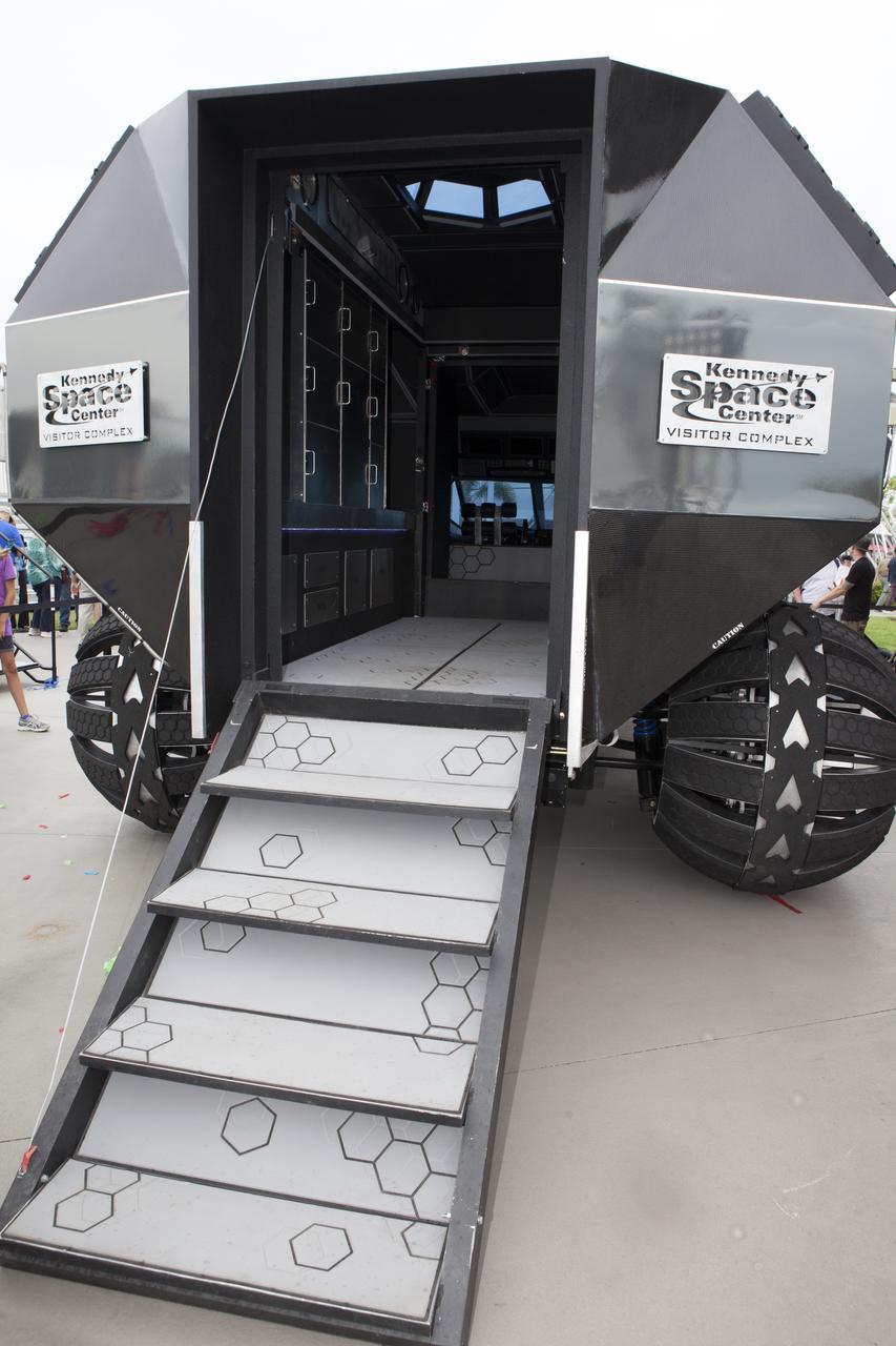 The scientifically-themed Mars rover concept vehicle operates on an electric motor, powered by solar panels and a 700-volt battery. The back section opens and serves as a laboratory which can disconnect for autonomous research. While this exact rover is not expected to operate on Mars, one or more of its elements could make its way into a rover astronauts will drive on the Red Planet. The "Summer of Mars" promotion is designed to provide guests with a better understanding of NASA's studies of the Red Planet. The builders of the rover, Parker Brothers Concepts of Port Canaveral, Florida, incorporated input into its design from NASA subject matter experts.
