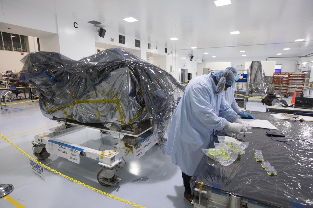 In the Space Station Processing Facility at NASA's Kennedy Space Center in Florida, technicians and engineers inspect components for the Cosmic-Ray Energetics and Mass investigation, or CREAM, instrument. It is designed to measure the charges of cosmic rays to better understand what gives them such incredible energies, and how that effects the composition of the universe. The instrument will be launched to the space station on the SpaceX CRS-12 commercial resupply mission in August 2017.