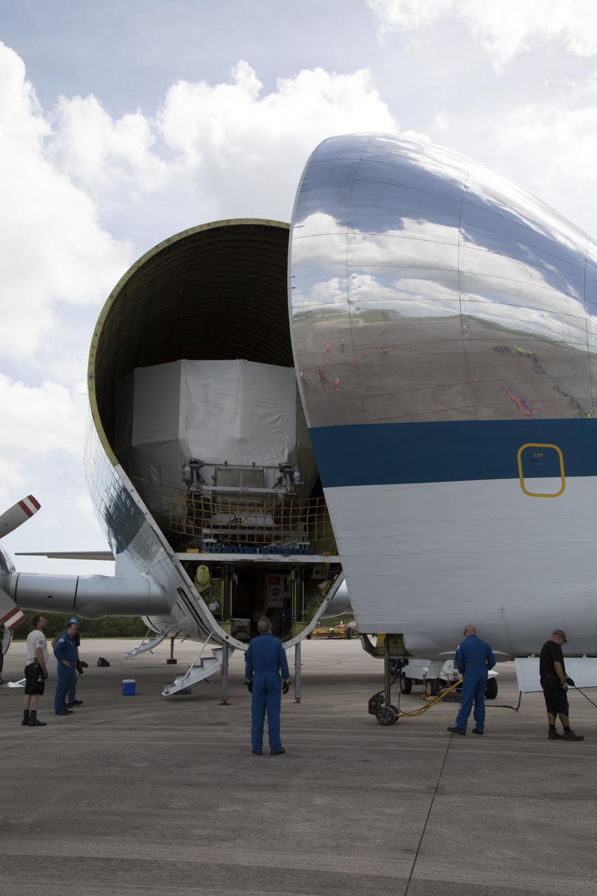 The Orion service module structural test article for Exploration Mission-1 (EM-1), built by the European Space Agency, is secured inside NASA's Super Guppy aircraft at Kennedy Space Center's Shuttle Landing Facility, managed by Space Florida. The module will be shipped to Lockheed Martin's Denver facility to undergo testing. The Orion spacecraft will launch atop the agency's Space Launch System rocket on EM-1 in 2019.