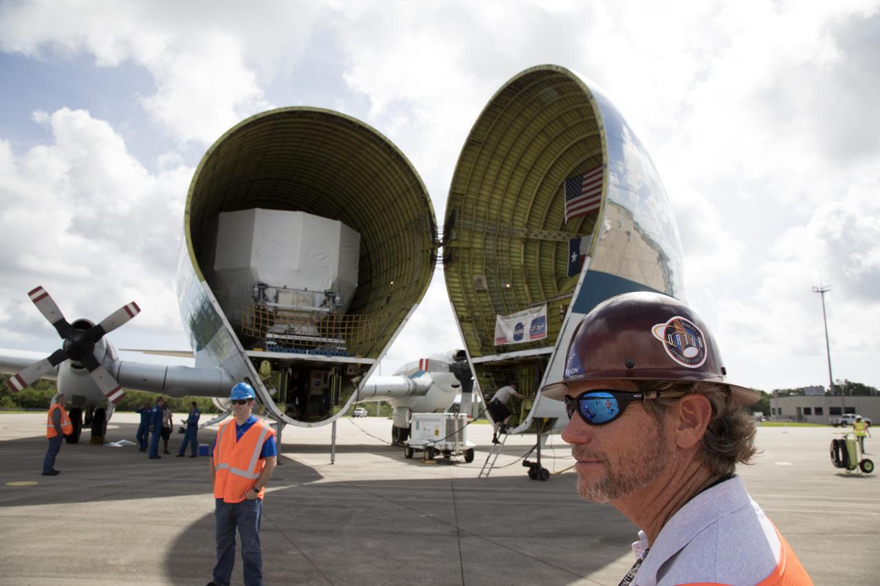 The Orion service module structural test article for Exploration Mission-1 (EM-1), built by the European Space Agency, is secured inside NASA's Super Guppy aircraft at Kennedy Space Center's Shuttle Landing Facility, managed by Space Florida. The module will be shipped to Lockheed Martin's Denver facility to undergo testing. The Orion spacecraft will launch atop the agency's Space Launch System rocket on EM-1 in 2019.