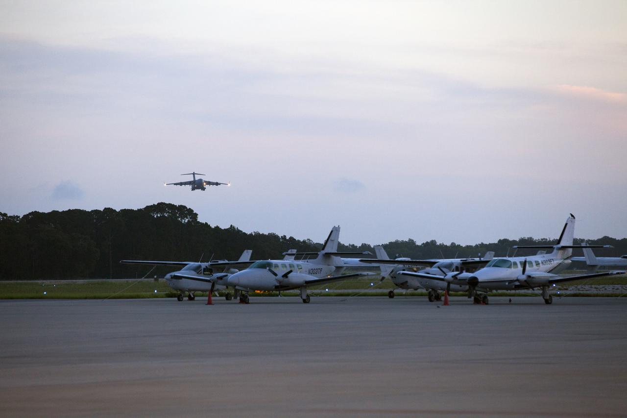 In early morning hours, NASA's TDRS-M satellite arrives at Space Coast Regional Airport in Titusville, Florida, aboard a U.S. Air Force transport aircraft. The spacecraft will be transported to the nearby Astrotech facility, also in Titusville, for preflight processing. The TDRS-M is the latest spacecraft destined for the agency's constellation of communications satellites that allows nearly continuous contact with orbiting spacecraft ranging from the International Space Station and Hubble Space Telescope to the array of scientific observatories. Liftoff atop a United Launch Alliance Atlas V rocket is scheduled to take place from Space Launch Complex 41 at Cape Canaveral Air Force Station at 9:02 a.m. EDT Aug. 3, 2017.