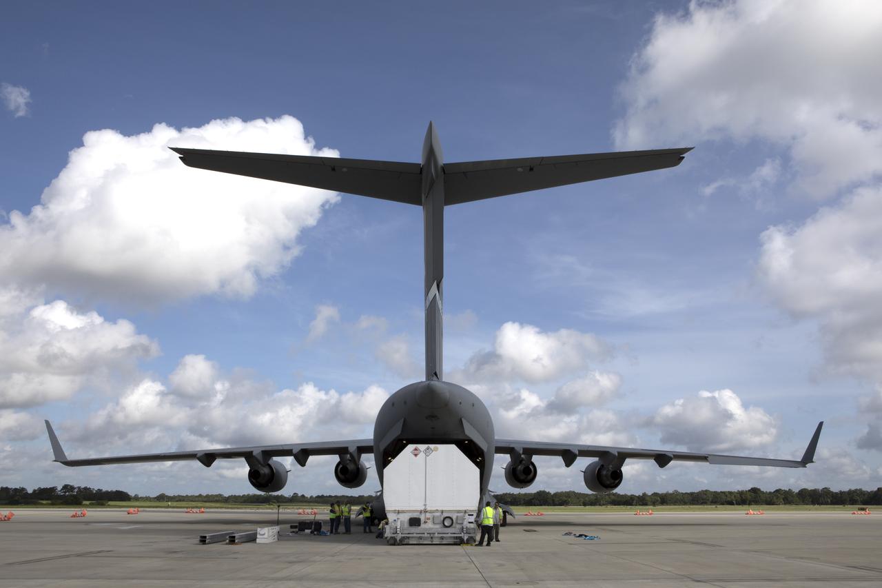 NASA's TDRS-M satellite arrives inside its shipping container at Space Coast Regional Airport in Titusville, Florida, aboard a U.S. Air Force transport aircraft. The spacecraft will be transported to the nearby Astrotech facility, also in Titusville, for preflight processing. The TDRS-M is the latest spacecraft destined for the agency's constellation of communications satellites that allows nearly continuous contact with orbiting spacecraft ranging from the International Space Station and Hubble Space Telescope to the array of scientific observatories. Liftoff atop a United Launch Alliance Atlas V rocket is scheduled to take place from Space Launch Complex 41 at Cape Canaveral Air Force Station at 9:02 a.m. EDT Aug. 3, 2017.