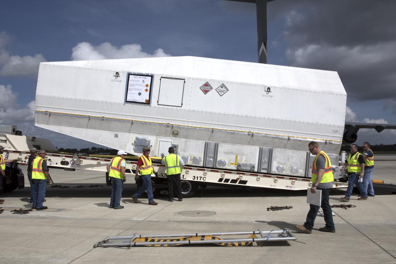 NASA's TDRS-M satellite arrives inside its shipping container at Space Coast Regional Airport in Titusville, Florida, aboard a U.S. Air Force transport aircraft. The spacecraft will be transported to the nearby Astrotech facility, also in Titusville, for preflight processing. The TDRS-M is the latest spacecraft destined for the agency's constellation of communications satellites that allows nearly continuous contact with orbiting spacecraft ranging from the International Space Station and Hubble Space Telescope to the array of scientific observatories. Liftoff atop a United Launch Alliance Atlas V rocket is scheduled to take place from Space Launch Complex 41 at Cape Canaveral Air Force Station at 9:02 a.m. EDT Aug. 3, 2017.