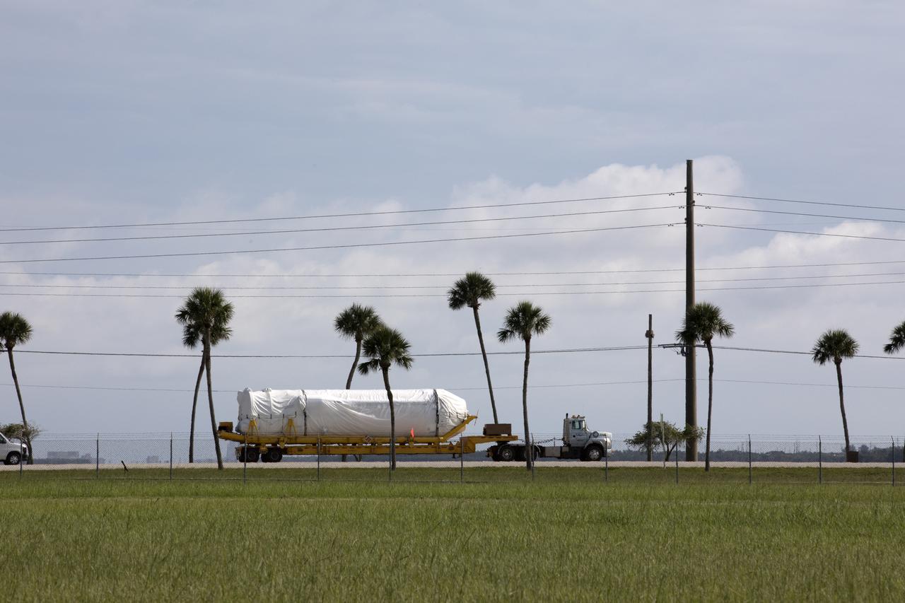 A United Launch Alliance Centaur uppoer stage is transported to the Atlas Spaceflight Operations Center at Cape Canaveral Air Force Station in Florida. The rocket is scheduled to launch the Tracking and Data Relay Satellite, TDRS-M. It will be the latest spacecraft destined for the agency's constellation of communications satellites that allows nearly continuous contact with orbiting spacecraft ranging from the International Space Station and Hubble Space Telescope to the array of scientific observatories. Liftoff atop the ULA Atlas V rocket is scheduled to take place from Cape Canaveral's Space Launch Complex 41 on Aug. 3, 2017 at 9:02 a.m. EDT.