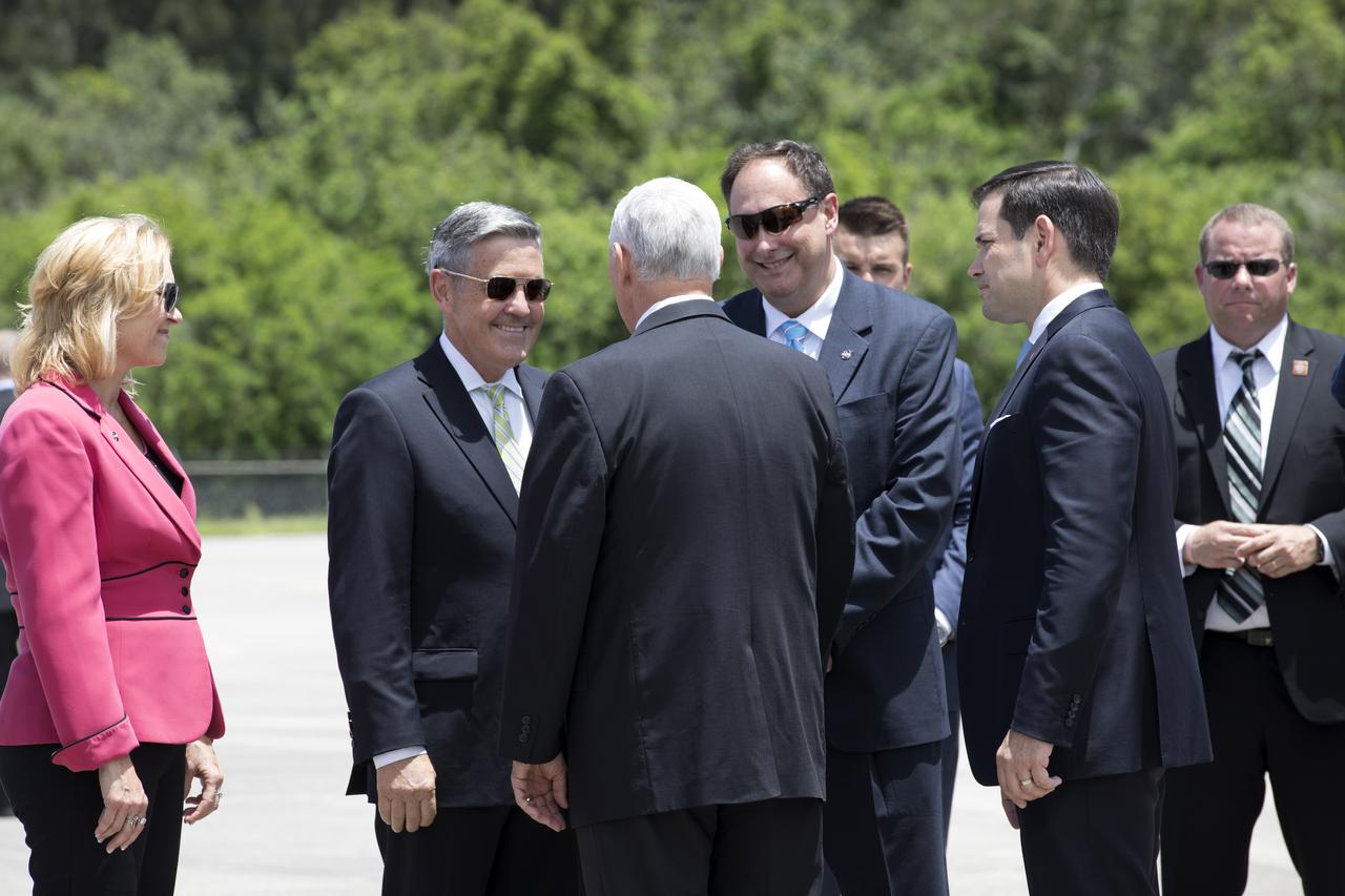 Vice President Mike Pence, back to the camera, is greeted by NASA officials at the Shuttle Landing Facility at NASA's Kennedy Space Center in Florida. From the left are, Deputy Center Director Janet Petro, Center Director Bob Cabana and Acting Administrator Robert Lightfoot. To the right of Lightfoot is Sen. Marco Rubio of Florida. During his visit to Kennedy, the Vice President spoke inside the iconic Vehicle Assembly Building, where he thanked employees for advancing American leadership in space. 