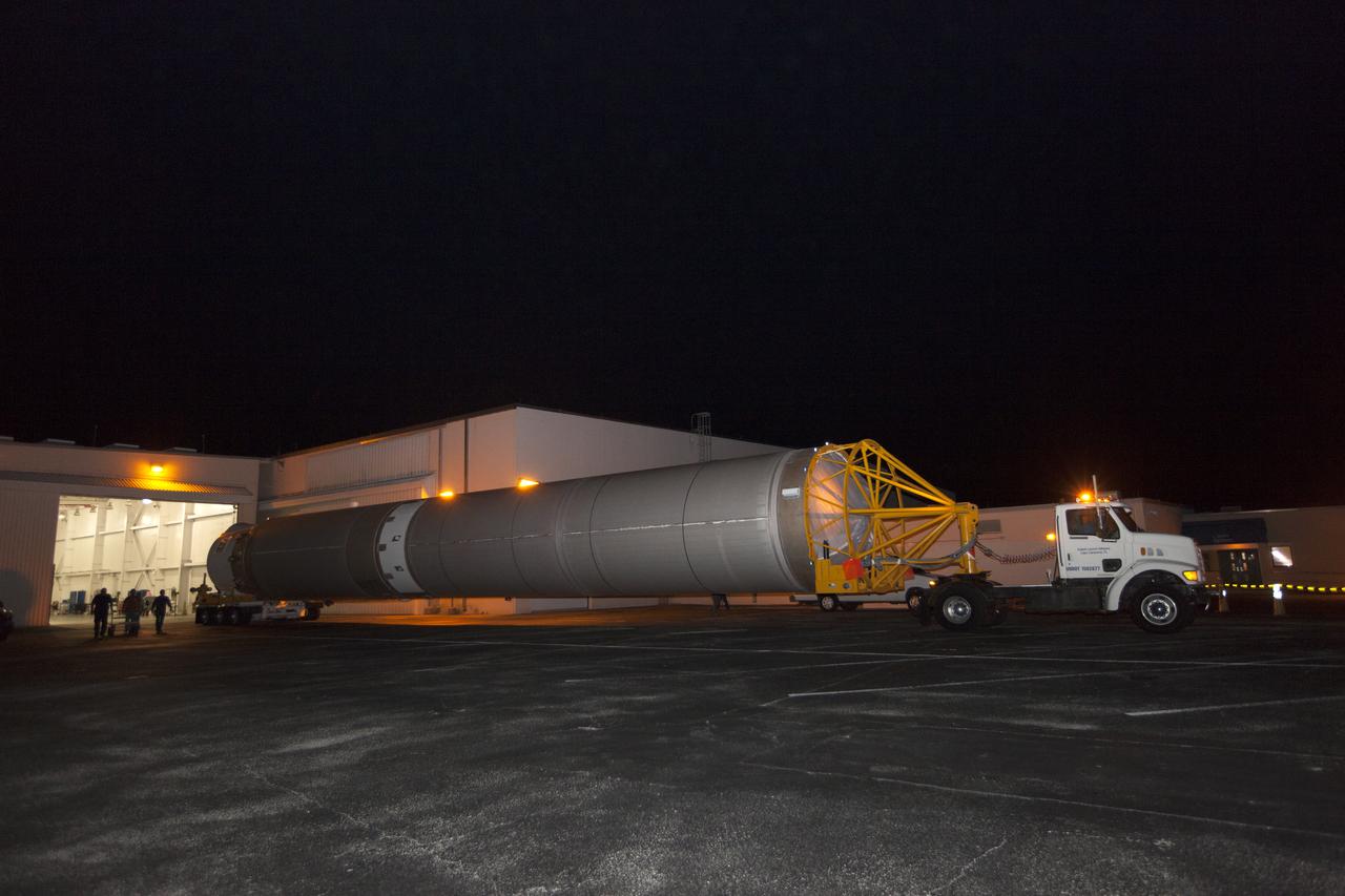 A United Launch Alliance Atlas V first stage leaves the Atlas Space Operations Center aboard a transport trailer for delivery to the Vertical Integration Facility at Space Launch Complex 41 at Cape Canaveral Air Force Station in Florida. The rocket is scheduled to launch the Tracking and Data Relay Satellite, TDRS-M. It will be the latest spacecraft destined for the agency's constellation of communications satellites that allows nearly continuous contact with orbiting spacecraft ranging from the International Space Station and Hubble Space Telescope to the array of scientific observatories. Liftoff atop the ULA Atlas V rocket is scheduled to take place from Cape Canaveral's Space Launch Complex 41 on Aug. 3, 2017 at 9:02 a.m. EDT.