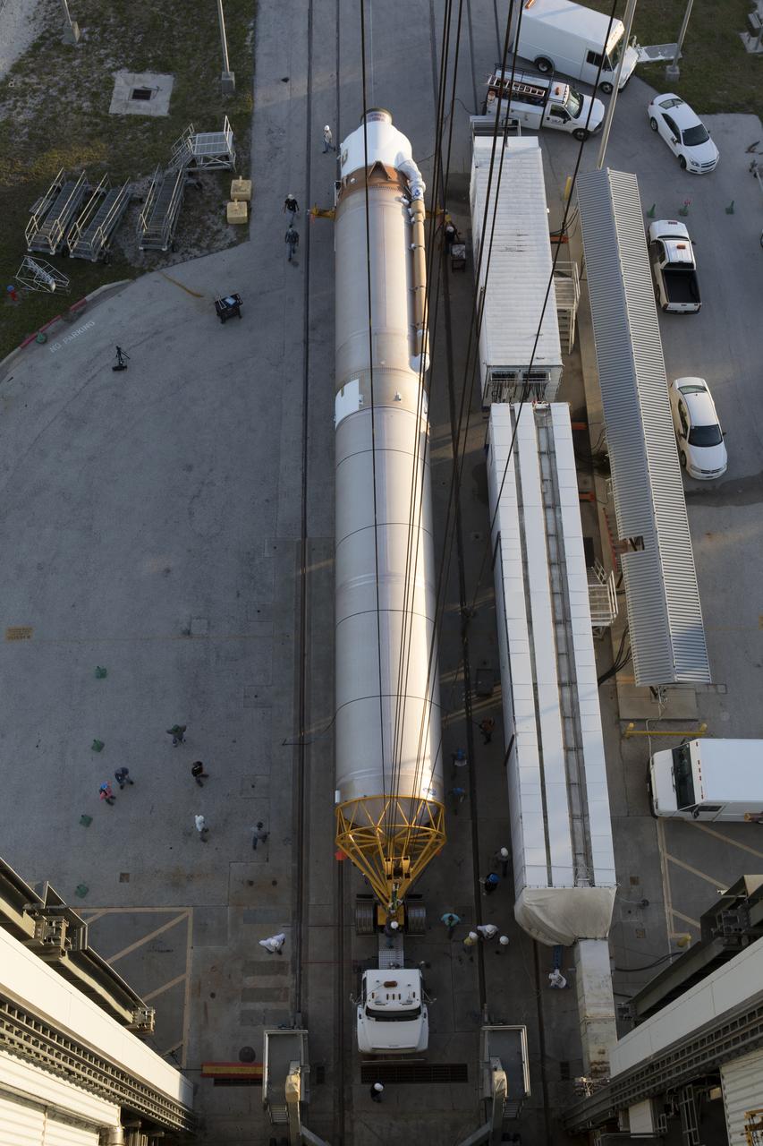 Viewed overhead from the Vertical Integration Facility at Space Launch Complex 41 at Cape Canaveral Air Force Station in Florida, a United Launch Alliance Atlas V first stage arrives for the Tracking and Data Relay Satellite, TDRS-M, mission. The rocket is scheduled to launch the latest TDRS satellite as part of the agency's constellation of communications satellites that allows nearly continuous contact with orbiting spacecraft ranging from the International Space Station and Hubble Space Telescope to the array of scientific observatories. Liftoff atop the ULA Atlas V rocket is scheduled to take place from Cape Canaveral's Space Launch Complex 41 on Aug. 3, 2017 at 9:02 a.m. EDT.