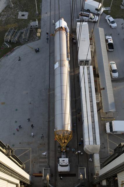NASA image: TDRS-M Atlas V First Stage Booster Lift to Vertical on Stand (LV
