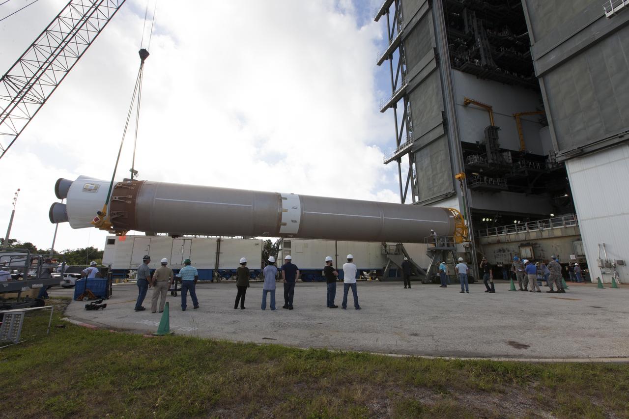 United Launch Alliance team members monitor the progress as the operation begins to lift the Atlas V first stage to the vertical position at the Vertical Integration Facility at Space Launch Complex 41 at Cape Canaveral Air Force Station in Florida. The rocket is scheduled to launch the Tracking and Data Relay Satellite, TDRS-M. It will be the latest spacecraft destined for the agency's constellation of communications satellites that allows nearly continuous contact with orbiting spacecraft ranging from the International Space Station and Hubble Space Telescope to the array of scientific observatories. Liftoff atop the ULA Atlas V rocket is scheduled to take place from Cape Canaveral's Space Launch Complex 41 on Aug. 3, 2017 at 9:02 a.m. EDT.