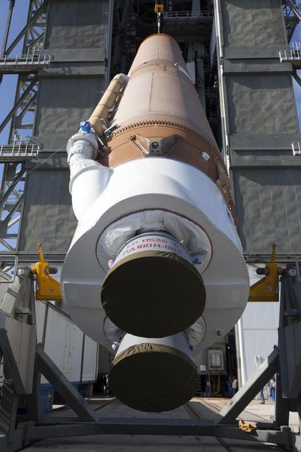 NASA image: TDRS-M Atlas V First Stage Booster Lift to Vertical on Stand (LV