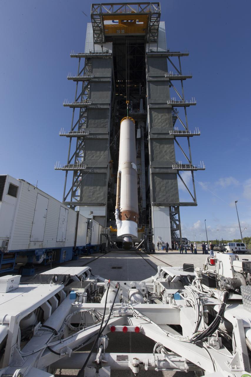 A United Launch Alliance Atlas V first stage is lifted at the Vertical Integration Facility at Space Launch Complex 41 at Cape Canaveral Air Force Station in Florida. The rocket is scheduled to launch the Tracking and Data Relay Satellite, TDRS-M. It will be the latest spacecraft destined for the agency's constellation of communications satellites that allows nearly continuous contact with orbiting spacecraft ranging from the International Space Station and Hubble Space Telescope to the array of scientific observatories. Liftoff atop the ULA Atlas V rocket is scheduled to take place from Cape Canaveral's Space Launch Complex 41 on Aug. 3, 2017 at 9:02 a.m. EDT.