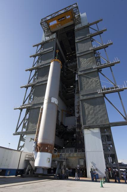 NASA image: TDRS-M Atlas V First Stage Booster Lift to Vertical on Stand (LV