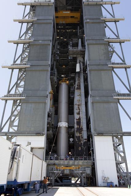 NASA image: TDRS-M Atlas V First Stage Booster Lift to Vertical on Stand (LV
