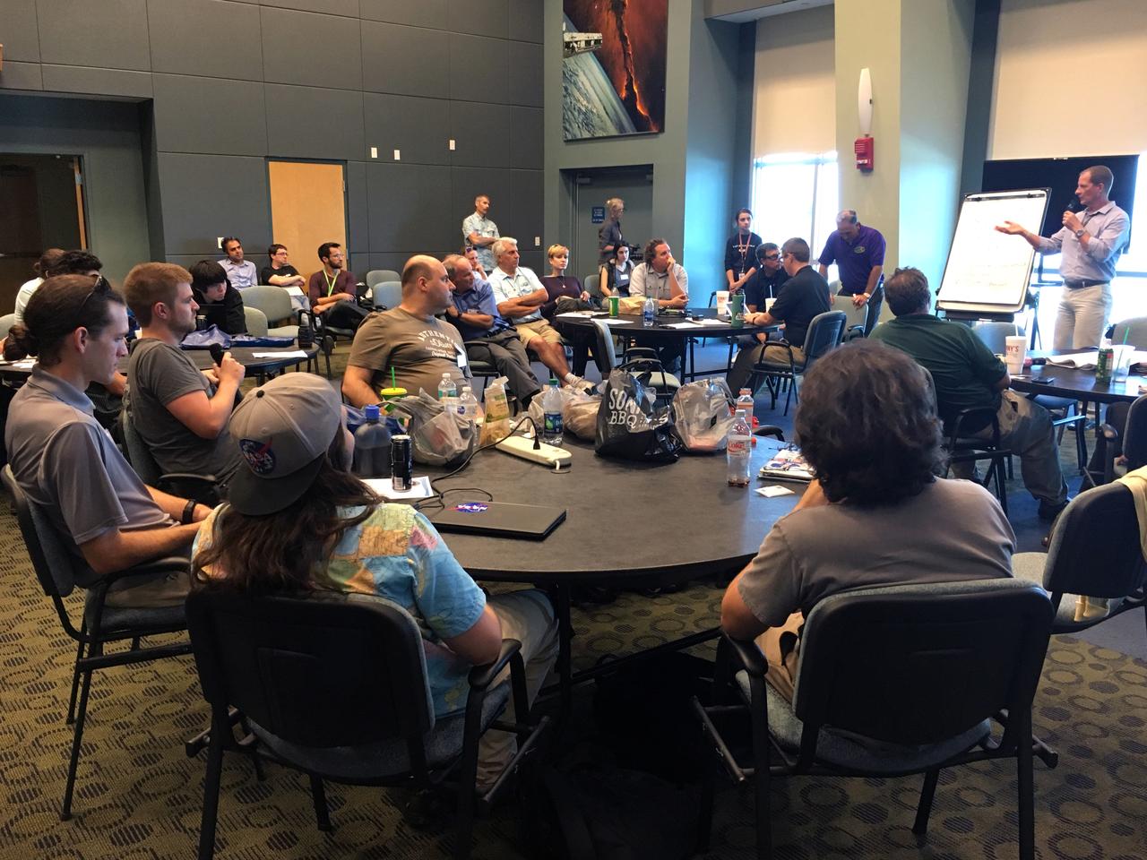 Scientists in the Exploration Research and Technology Directorate brainstorm innovative approaches to food production with industry representatives at the Space Station Processing Facility at NASA's Kennedy Space Center in Florida.