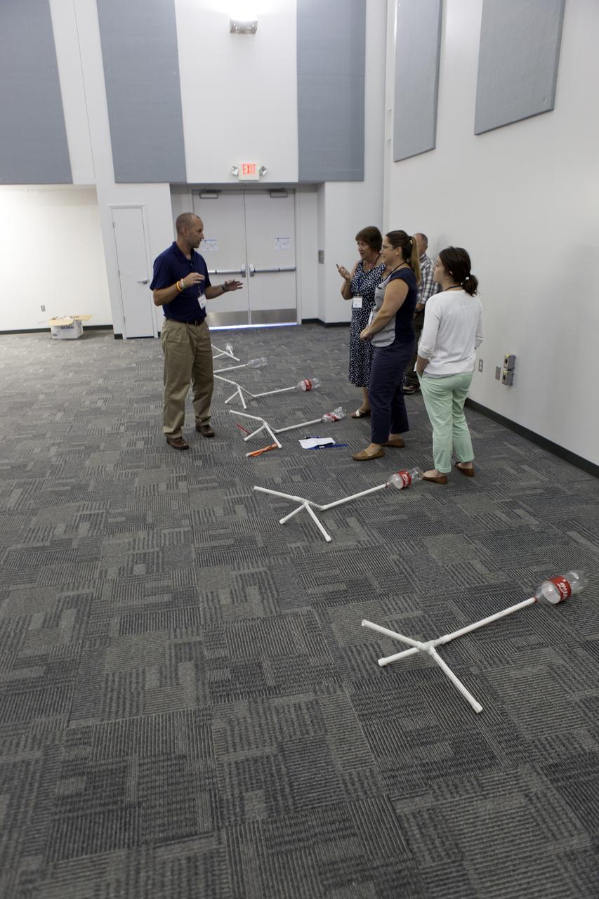 Teachers prepare to demonstrate the projects they built for the Rocketry Engineering Design Challenge during the 2017 GE Foundation High School STEM Integration Conference at the Center for Space Education at NASA's Kennedy Space Center. High school teachers from across the country took part in the week-long conference, which is designed to explore effective ways for teachers, schools and districts from across the country to integrate STEM throughout the curriculum. The conference is a partnership between GE Foundation and the National Science Teachers Association.