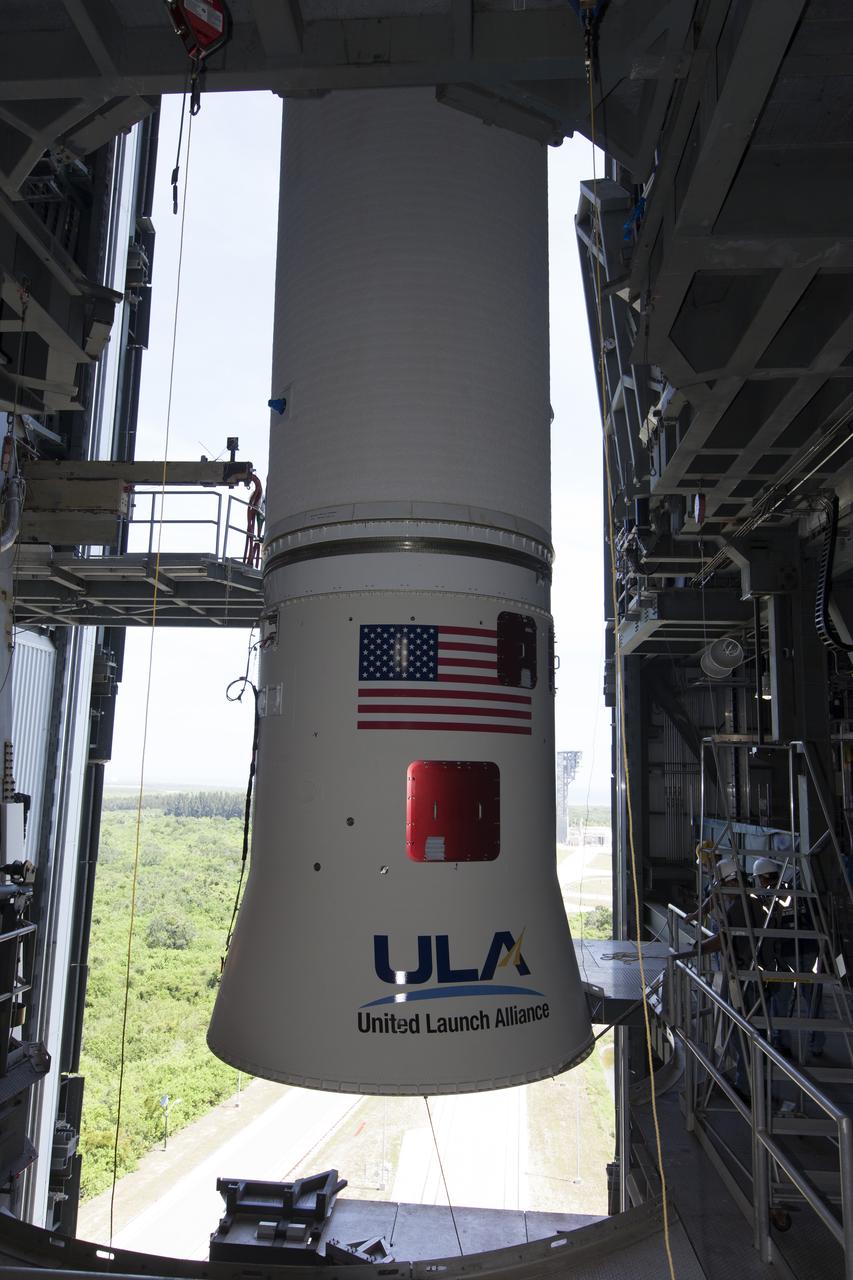 At the Vertical Integration Facility at Space Launch Complex 41 at Cape Canaveral Air Force Station in Florida, a United Launch Alliance Centaur upper stage is positioned prior to mating to an Atlas V booster. The rocket is scheduled to launch the Tracking and Data Relay Satellite, TDRS-M. It will be the latest spacecraft destined for the agency's constellation of communications satellites that allows nearly continuous contact with orbiting spacecraft ranging from the International Space Station and Hubble Space Telescope to the array of scientific observatories. Liftoff atop the ULA Atlas V rocket is scheduled to take place from Cape Canaveral's Space Launch Complex 41 in early August.