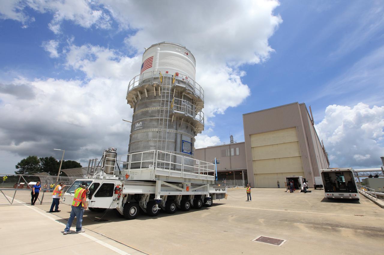 Packed inside its canister, the Interim Cryogenic Propulsion Stage (ICPS) for NASA's Space Launch System (SLS) rocket arrives at the low bay entrance of the Space Station Processing Facility at NASA's Kennedy Space Center in Florida. The ICPS is the first integrated piece of flight hardware to arrive for the SLS. It is the in-space stage that is located toward the top of the rocket, between the Launch Vehicle Stage Adapter and the Orion Spacecraft Adapter. It will provide some of the in-space propulsion during Orion's first flight test atop the SLS on Exploration Mission-1. 
