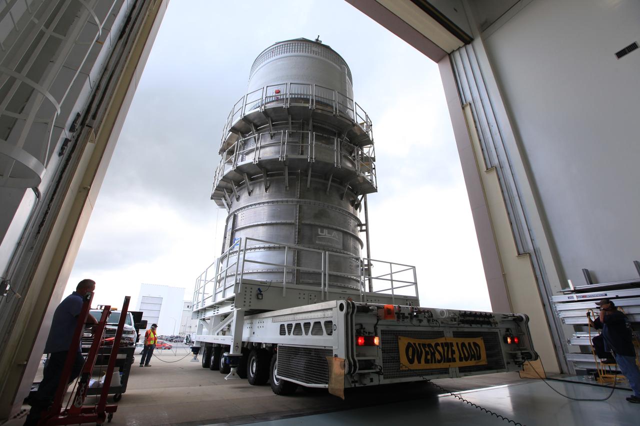 Packed inside its canister, the Interim Cryogenic Propulsion Stage (ICPS) for NASA's Space Launch System (SLS) rocket is moved into the low bay entrance of the Space Station Processing Facility at NASA's Kennedy Space Center in Florida. The ICPS is the first integrated piece of flight hardware to arrive for the SLS. It is the in-space stage that is located toward the top of the rocket, between the Launch Vehicle Stage Adapter and the Orion Spacecraft Adapter. It will provide some of the in-space propulsion during Orion's first flight test atop the SLS on Exploration Mission-1. 