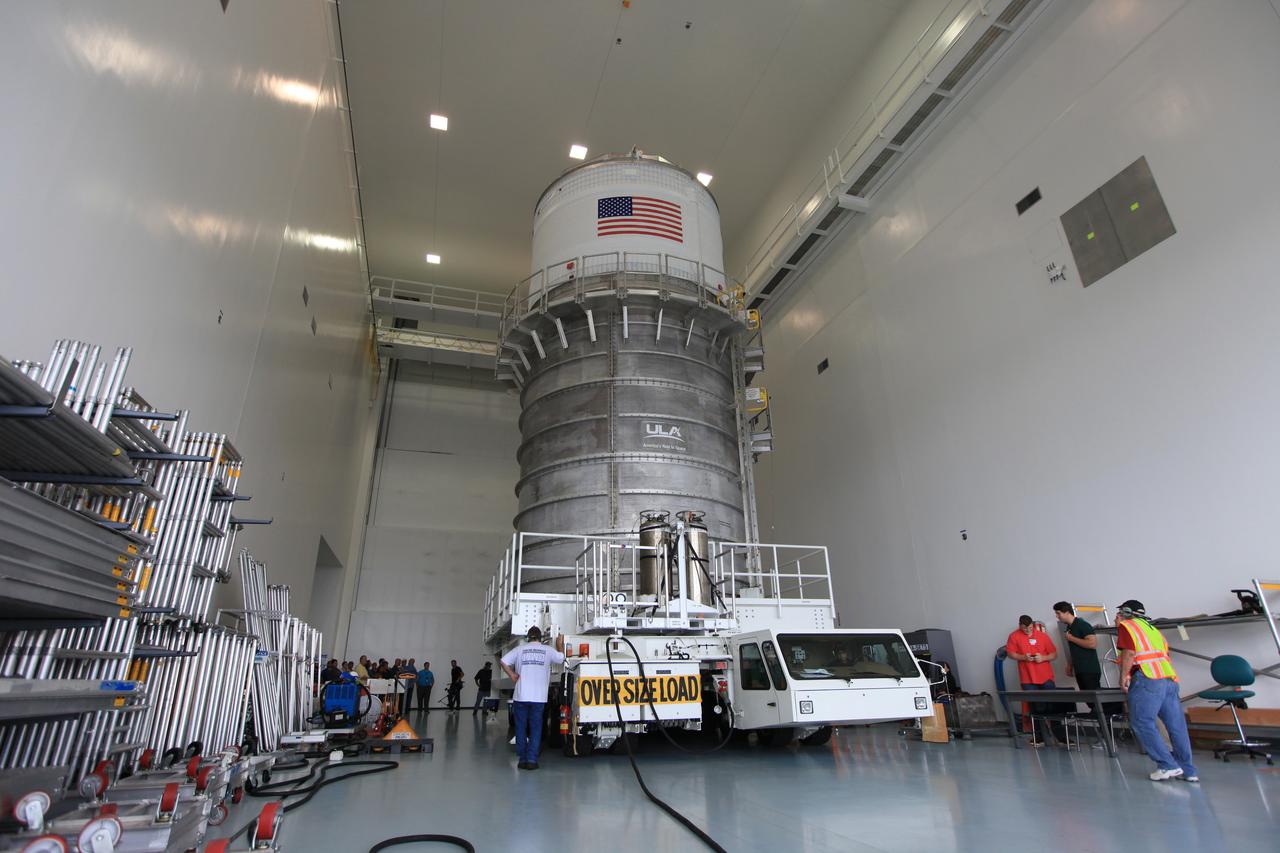 Packed inside its canister, the Interim Cryogenic Propulsion Stage (ICPS) for NASA's Space Launch System (SLS) rocket has been moved inside the low bay entrance of the Space Station Processing Facility at NASA's Kennedy Space Center in Florida. The ICPS is the first integrated piece of flight hardware to arrive for the SLS. It is the in-space stage that is located toward the top of the rocket, between the Launch Vehicle Stage Adapter and the Orion Spacecraft Adapter. It will provide some of the in-space propulsion during Orion's first flight test atop the SLS on Exploration Mission-1.
