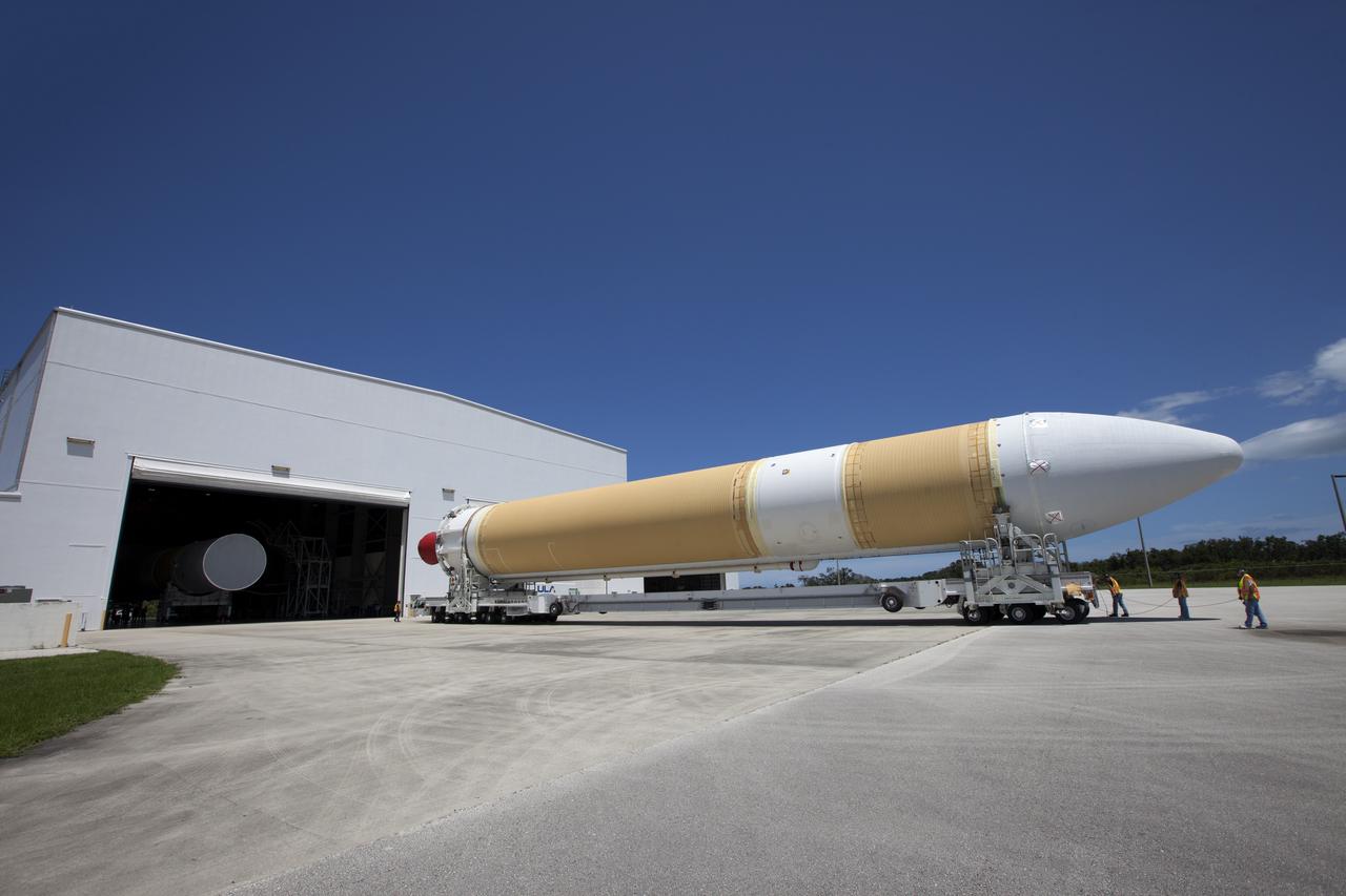 A United Launch Alliance Delta IV Heavy common booster core arrives by truck at Cape Canaveral Air Force Station's Launch Complex 37 Horizontal Processing Facility. The Delta IV Heavy will launch NASA's upcoming Parker Solar Probe mission. The mission will perform the closest-ever observations of a star when it travels through the Sun's atmosphere, called the corona. The probe will rely on measurements and imaging to revolutionize our understanding of the corona and the Sun-Earth connection. Liftoff atop the Delta IV Heavy rocket is scheduled to take place from Cape Canaveral's Space Launch Complex 37 in summer 2018. 
