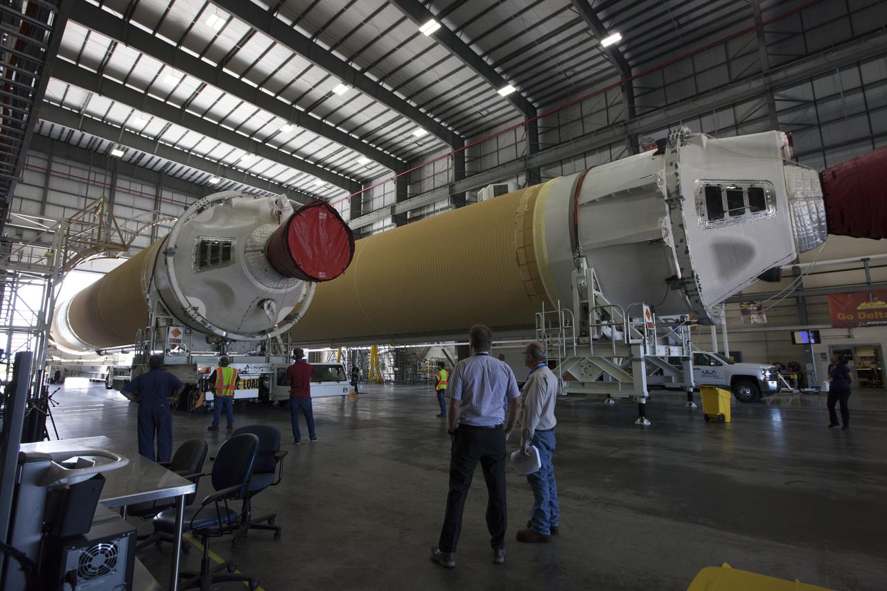 A United Launch Alliance Delta IV Heavy common booster core is transported by truck into Cape Canaveral Air Force Station's Launch Complex 37 Horizontal Processing Facility. The Delta IV Heavy will launch NASA's upcoming Parker Solar Probe mission. The mission will perform the closest-ever observations of a star when it travels through the Sun's atmosphere, called the corona. The probe will rely on measurements and imaging to revolutionize our understanding of the corona and the Sun-Earth connection. Liftoff atop the Delta IV Heavy rocket is scheduled to take place from Cape Canaveral's Space Launch Complex 37 in summer 2018. 