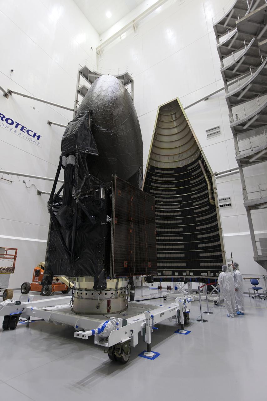 Inside the Astrotech facility in Titusville, Florida, the payload fairing for NASA's Tracking and Data Relay Satellite, TDRS-M, is moved into position to encapsulate the spacecraft. TDRS-M is the latest spacecraft destined for the agency's constellation of communications satellites that allows nearly continuous contact with orbiting spacecraft ranging from the International Space Station and Hubble Space Telescope to the array of scientific observatories. Liftoff atop a United Launch Alliance Atlas V rocket is scheduled to take place from Space Launch Complex 41 at Cape Canaveral Air Force Station at 8:03 a.m. EDT Aug. 18, 2017.
