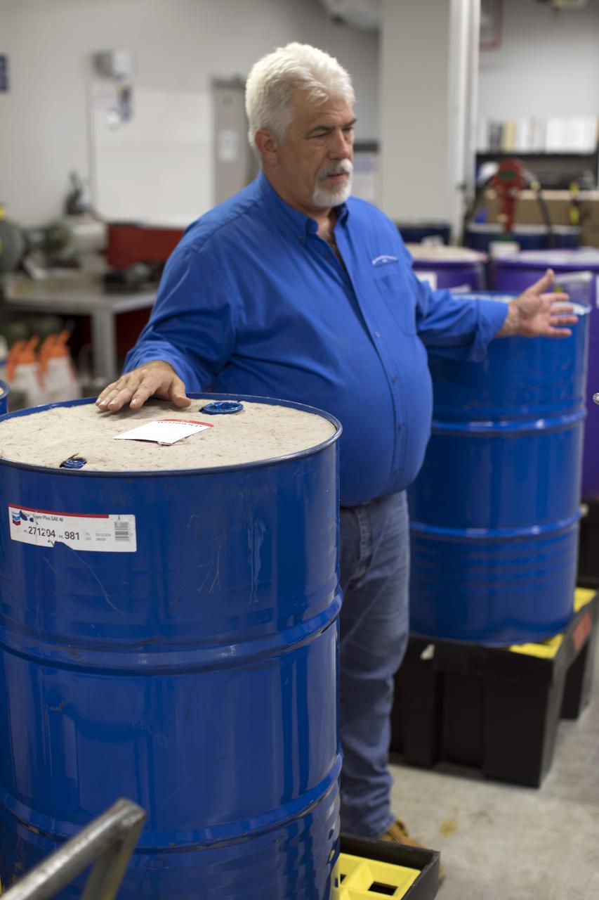 Tim King of Jacobs at NASA's Kennedy Space Center in Florida, explains operations in the Oil Pharmacy operated under the Test and Operations Support Contract, or TOSC. The facility consolidated storage and distribution of petroleum products used in equipment maintained under the contract. This included standardized naming, testing processes and provided a central location for distribution of oils used in everything from simple machinery to the crawler-transporter and cranes in the Vehicle Assembly Building.