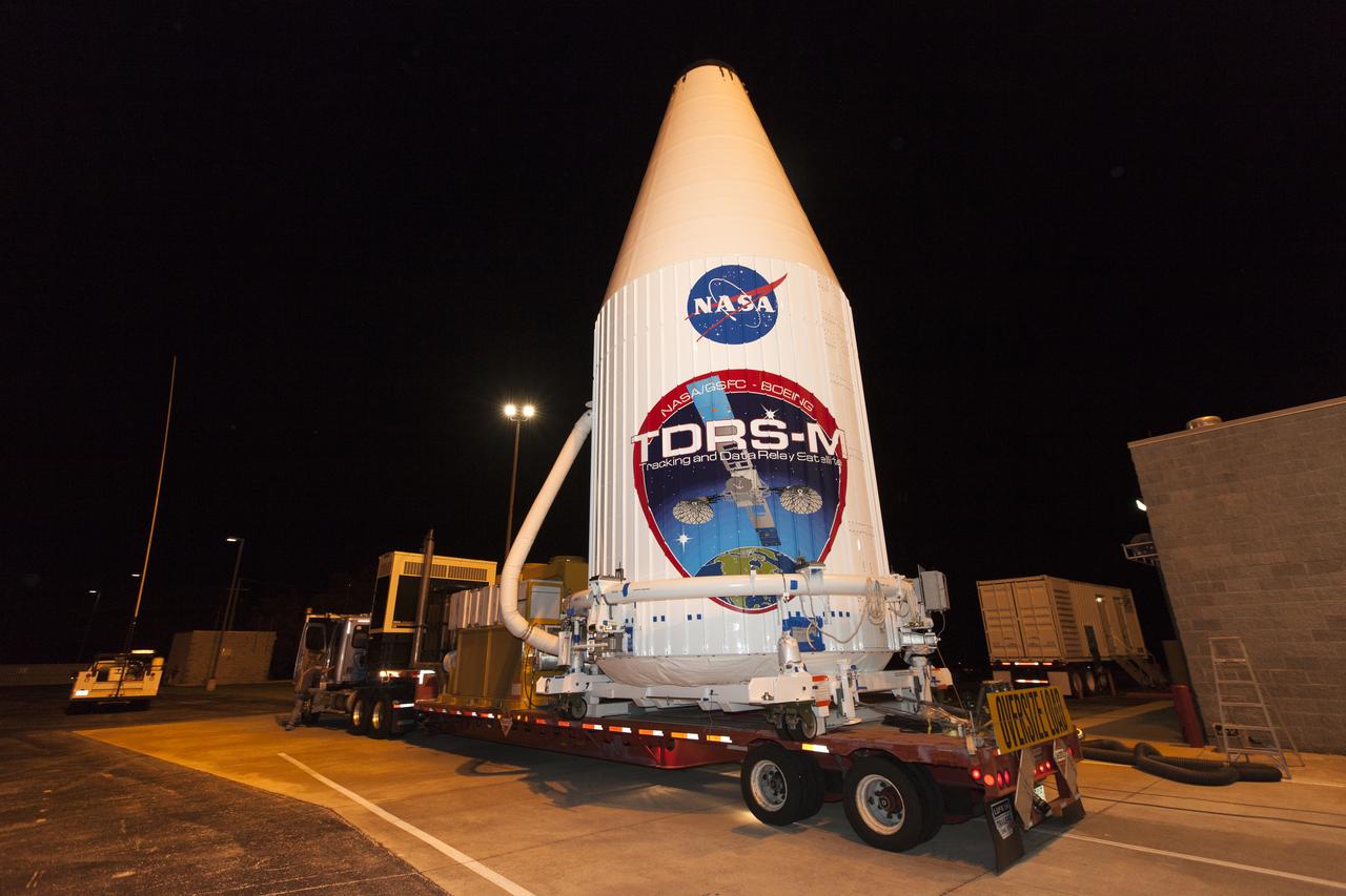 Inside the Astrotech facility in Titusville, Florida, the payload fairing for NASA's Tracking and Data Relay Satellite, TDRS-M, is moved into position to encapsulate the spacecraft. TDRS-M is the latest spacecraft destined for the agency's constellation of communications satellites that allows nearly continuous contact with orbiting spacecraft ranging from the International Space Station and Hubble Space Telescope to the array of scientific observatories. Liftoff atop a United Launch Alliance Atlas V rocket is scheduled to take place from Space Launch Complex 41 at Cape Canaveral Air Force Station at 8:03 a.m. EDT Aug. 18, 2017.