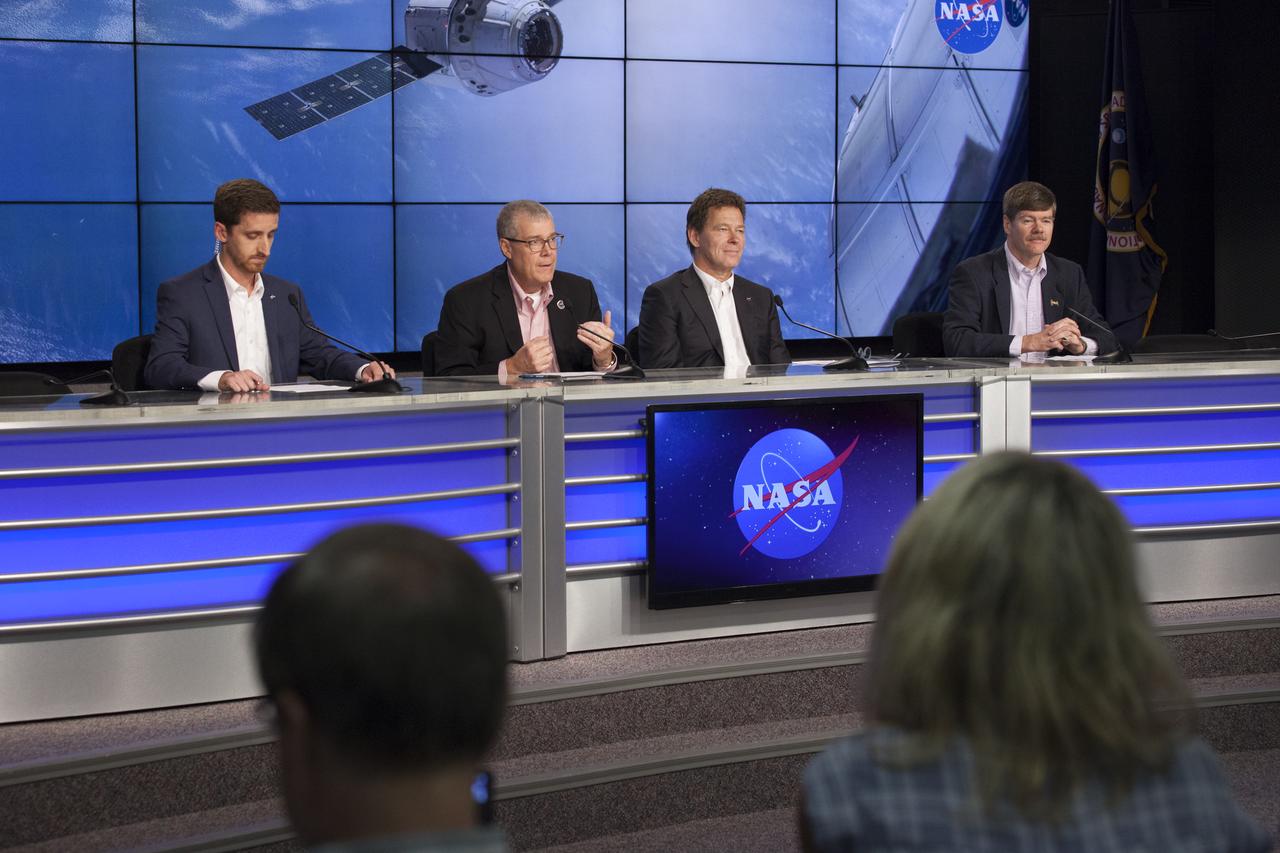 In the Kennedy Space Center’s Press Site auditorium, agency and industry leaders speak to members of the media during a prelaunch news conference for the SpaceX CRS-12 commercial resupply services mission to the International Space Station. From left are: Josh Finch of NASA Communications; Dan Hartman, NASA deputy manager of the International Space Station Program, Hans Koenigsmann, vice president of Build and Flight Reliability for SpaceX, and Pete Hasbrook, associate program scientist for the International Space Station Program. A Dragon spacecraft is scheduled to be launched from Kennedy’s Launch Complex 39A on Aug. 14 atop a SpaceX Falcon 9 rocket on the company's 12th Commercial Resupply Services mission to the space station.