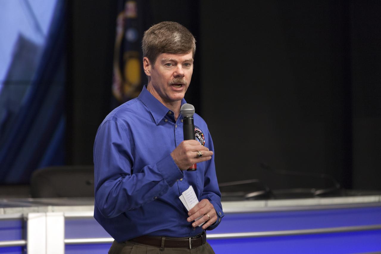 Pete Hasbrook, associate program scientist for the International Space Station Program, speaks to members of social media in the Kennedy Space Center’s Press Site auditorium. The briefing focused on research planned for launch to the International Space Station. The scientific materials and supplies will be aboard a Dragon spacecraft scheduled for launch from Kennedy’s Launch Complex 39A on Aug. 14 atop a SpaceX Falcon 9 rocket on the company's 12th Commercial Resupply Services mission to the space station.