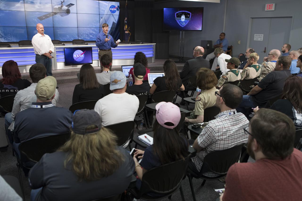Ken Shields, director of Operations for Center for the Advancement of Science in Space/ISS National Lab, left, and Pete Hasbrook, associate program scientist for the International Space Station Program, speak to members of social media in the Kennedy Space Center’s Press Site auditorium. The briefing focused on research planned for launch to the International Space Station. The scientific materials and supplies will be aboard a Dragon spacecraft scheduled for launch from Kennedy’s Launch Complex 39A on Aug. 14 atop a SpaceX Falcon 9 rocket on the company's 12th Commercial Resupply Services mission to the space station.