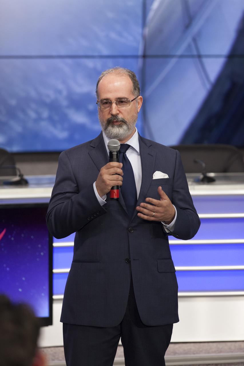 Marco Baptista, director of Research Programs for the Michael J. Fox Foundation, speaks to members of social media in the Kennedy Space Center’s Press Site auditorium about the Crystallization of LRRK2 Under Microgravity Conditions experiment. The briefing focused on research planned for launch to the International Space Station. The scientific materials and supplies will be aboard a Dragon spacecraft scheduled for launch from Kennedy’s Launch Complex 39A on Aug. 14 atop a SpaceX Falcon 9 rocket on the company's 12th Commercial Resupply Services mission to the space station.
