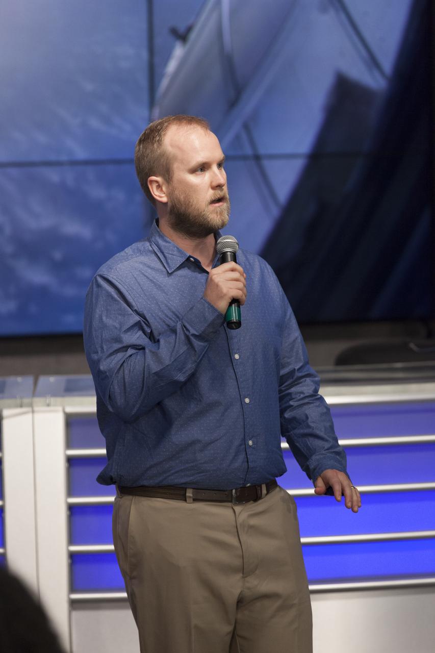 Jacob Smith of the University of Maryland speaks to members of social media in the Kennedy Space Center’s Press Site auditorium. He is operations lead for the International Space Station Cosmic Ray Energetics and Mass, or ISS-CREAM, investigation. The briefing focused on research planned for launch to the International Space Station. The scientific materials and supplies will be aboard a Dragon spacecraft scheduled for launch from Kennedy’s Launch Complex 39A on Aug. 14 atop a SpaceX Falcon 9 rocket on the company's 12th Commercial Resupply Services mission to the space station.