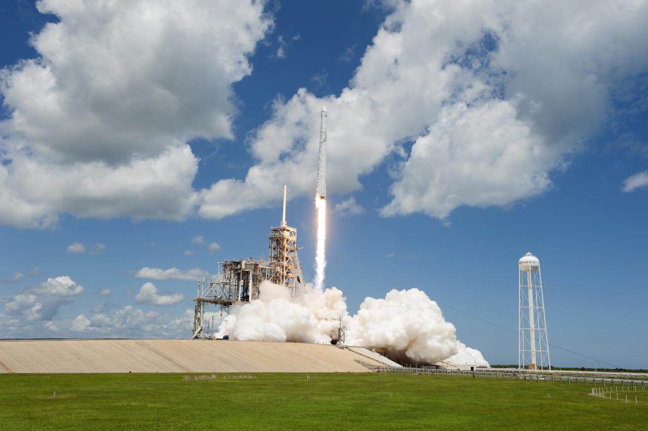The two-stage Falcon 9 launch vehicle roars off Launch Complex 39A at NASA's Kennedy Space Center in Florida carrying the Dragon resupply spacecraft to the International Space Station. Liftoff was at 12:31 p.m. EDT. On its 12th commercial resupply services mission to the International Space Station, Dragon will bring up more than 6,400 pounds of supplies and new science experiments and equipment for technology research.