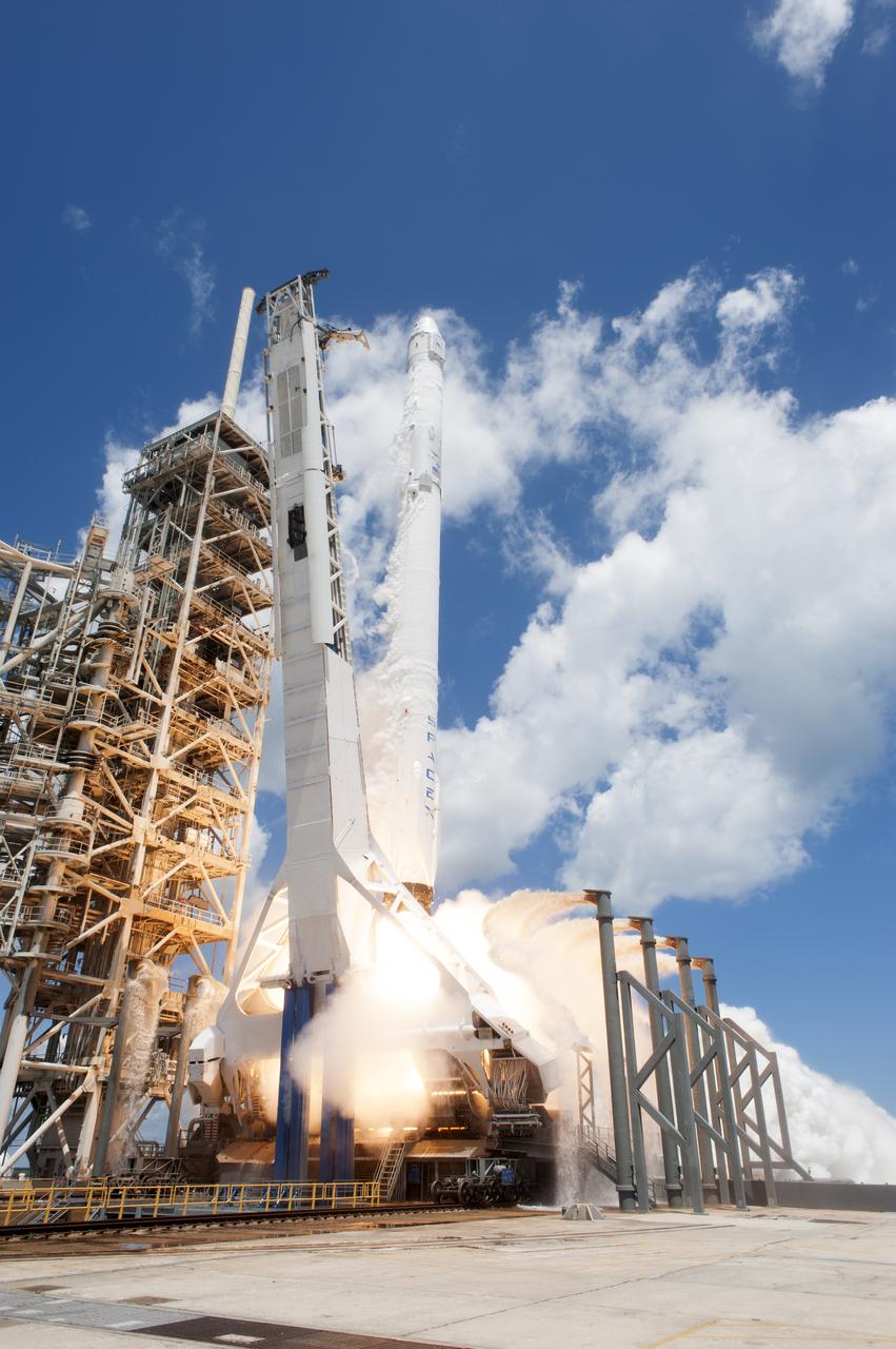 The two-stage SpaceX Falcon 9 launch vehicle lifts off Launch Complex 39A at NASA's Kenney Space Center carrying the Dragon resupply spacecraft to the International Space Station. Liftoff was at 12:31 p.m. EDT. On its 12th commercial resupply services mission to the International Space Station, Dragon will bring up more than 6,400 pounds of supplies and new science experiments and equipment for technology research.