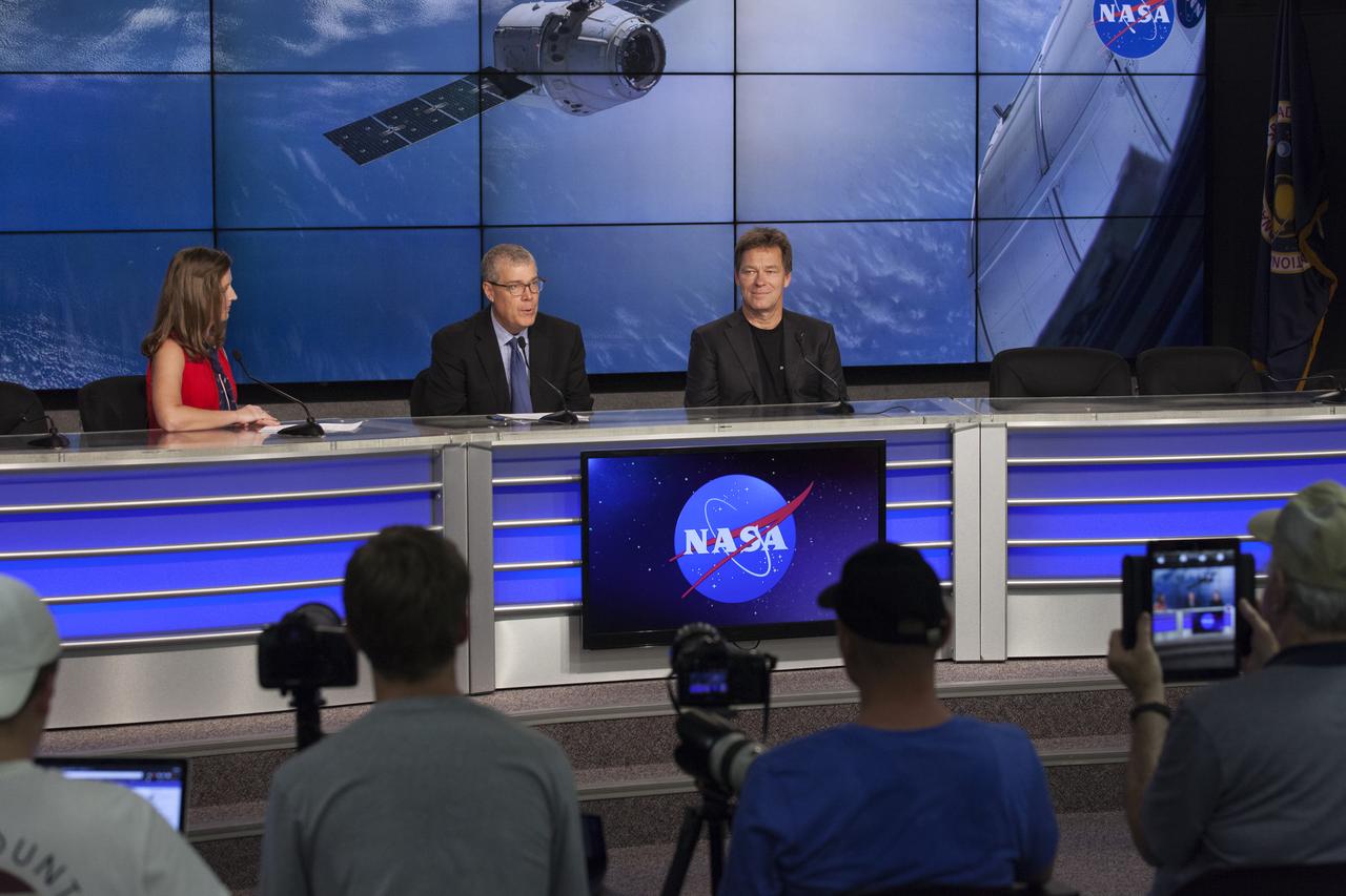 In the Press Site auditorium of NASA's Kennedy Space Center in Florida, NASA and industry leaders speak to media at a post-launch news conference following the liftoff of SpaceX CRS-12, a commercial resupply services mission to the International Space Station. From left are: Stephanie Martin of NASA Communications, Dan Hartman, NASA deputy manager of the International Space Station Program, and Hans Koenigsmann, SpaceX  vice president of Flight and Build Reliability. SpaceX CRS-12 lifted off atop a Falcon 9 rocket from Kennedy's Launch Complex 39A at 12:31 p.m. EDT.