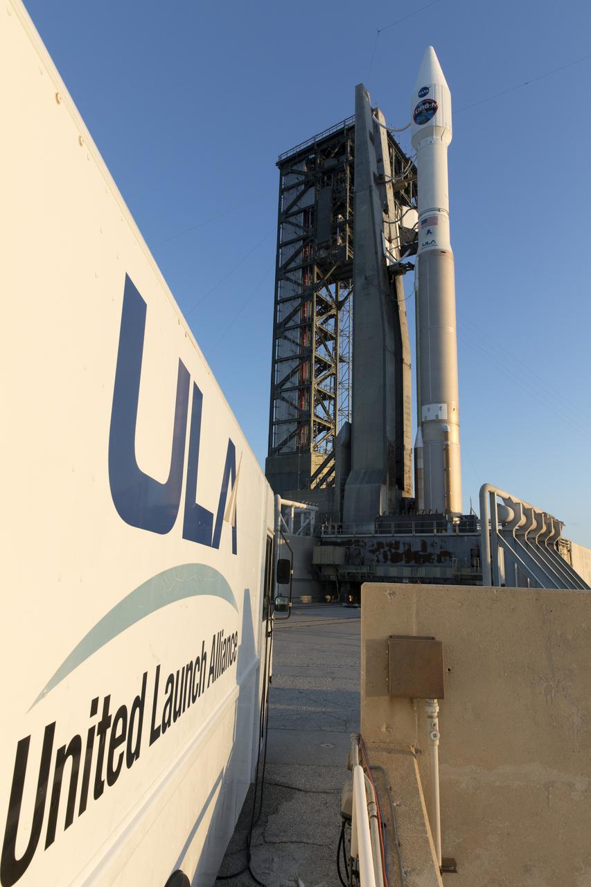 A United Launch Alliance Atlas V rocket reflects the rising sun as it stands at Space Launch Complex 41 at Cape Canaveral Air Force Station in Florida. The launch vehicle will send NASA's Tracking and Data Relay Satellite, TDRS-M to orbit. TDRS-M is the latest spacecraft destined for the agency's constellation of communications satellites that allows nearly continuous contact with orbiting spacecraft ranging from the International Space Station and Hubble Space Telescope to the array of scientific observatories. Liftoff atop a United Launch Alliance Atlas V rocket is scheduled to take place from Space Launch Complex 41 at Cape Canaveral Air Force Station at 8:03 a.m. EDT Aug. 18.