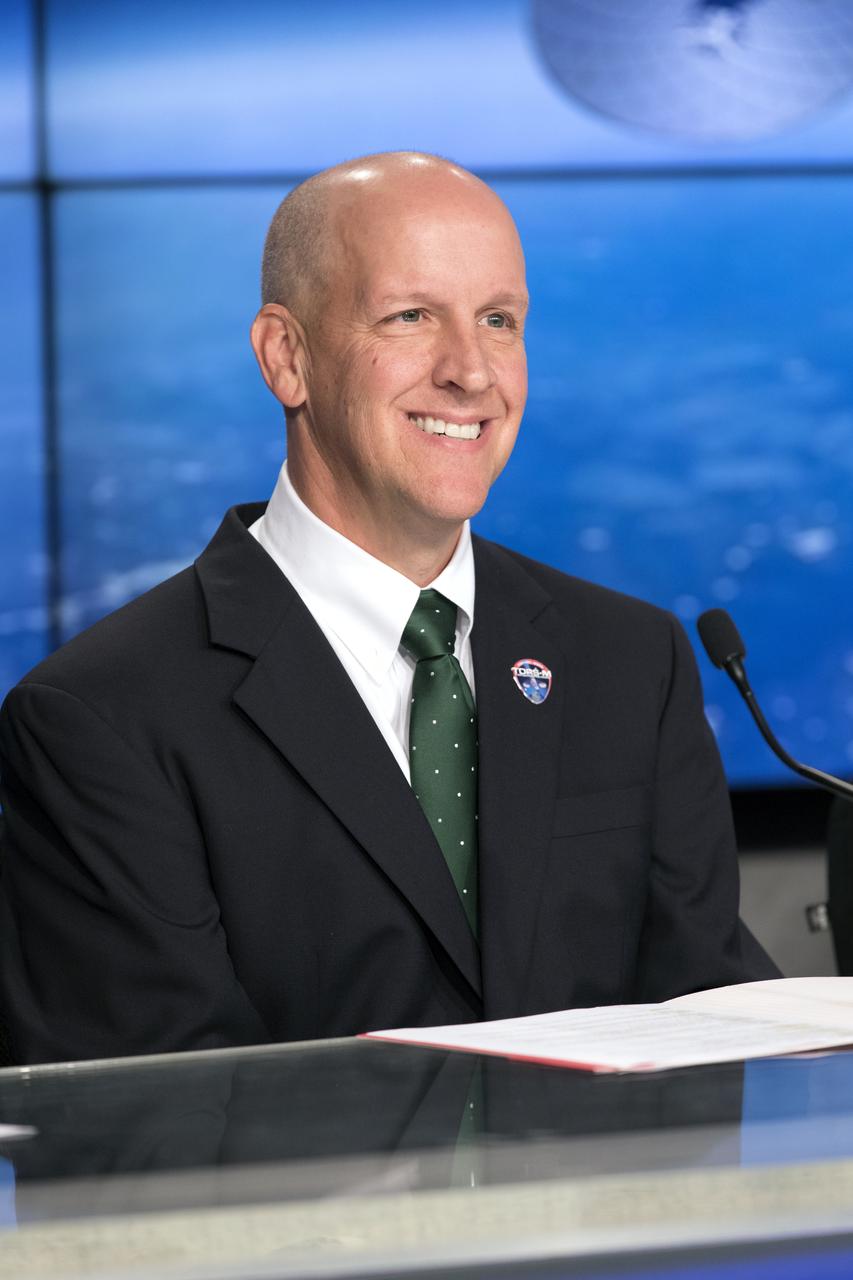 In the Kennedy Space Center's Press Site auditorium, Tim Dunn, launch director at NASA Kennedy, speaks to members of the media at a prelaunch news conference for NASA's Tracking and Data Relay Satellite, TDRS-M. It is the latest spacecraft destined for the agency's constellation of communications satellites that allows nearly continuous contact with orbiting spacecraft ranging from the International Space Station and Hubble Space Telescope to the array of scientific observatories. Liftoff atop a United Launch Alliance Atlas V rocket is scheduled to take place from Space Launch Complex 41 at Cape Canaveral Air Force Station at 8:03 a.m. EDT Aug. 18.