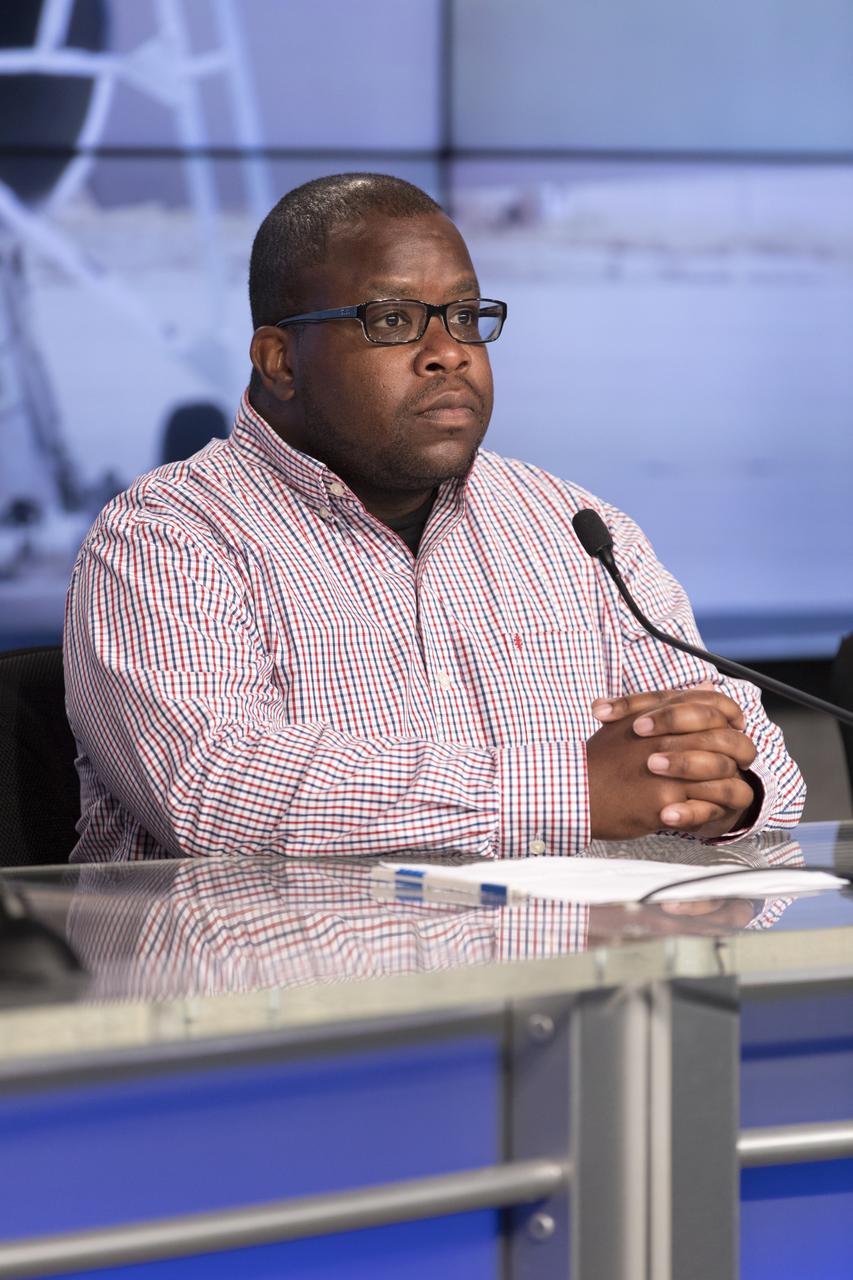 In the Kennedy Space Center's Press Site auditorium, Larry Cliatt, SonicBAT Fluid Mechanics at Armstrong Flight Research Center in California, speaks to members of the media at a news conference to discuss upcoming flight tests to study the effects of sonic booms. Kennedy is partnering with Armstrong, Langley and Space Florida for a program called SonicBAT for Sonic Booms in Atmospheric Turbulence. Starting in August, NASA F-18 jets will take off from the Shuttle Landing Facility and fly at supersonic speeds while agency researchers on the ground measure the effects of low-altitude turbulence on sonic booms. The study could lead to technology mitigating the annoying sonic booms making possible supersonic flights over populated areas.