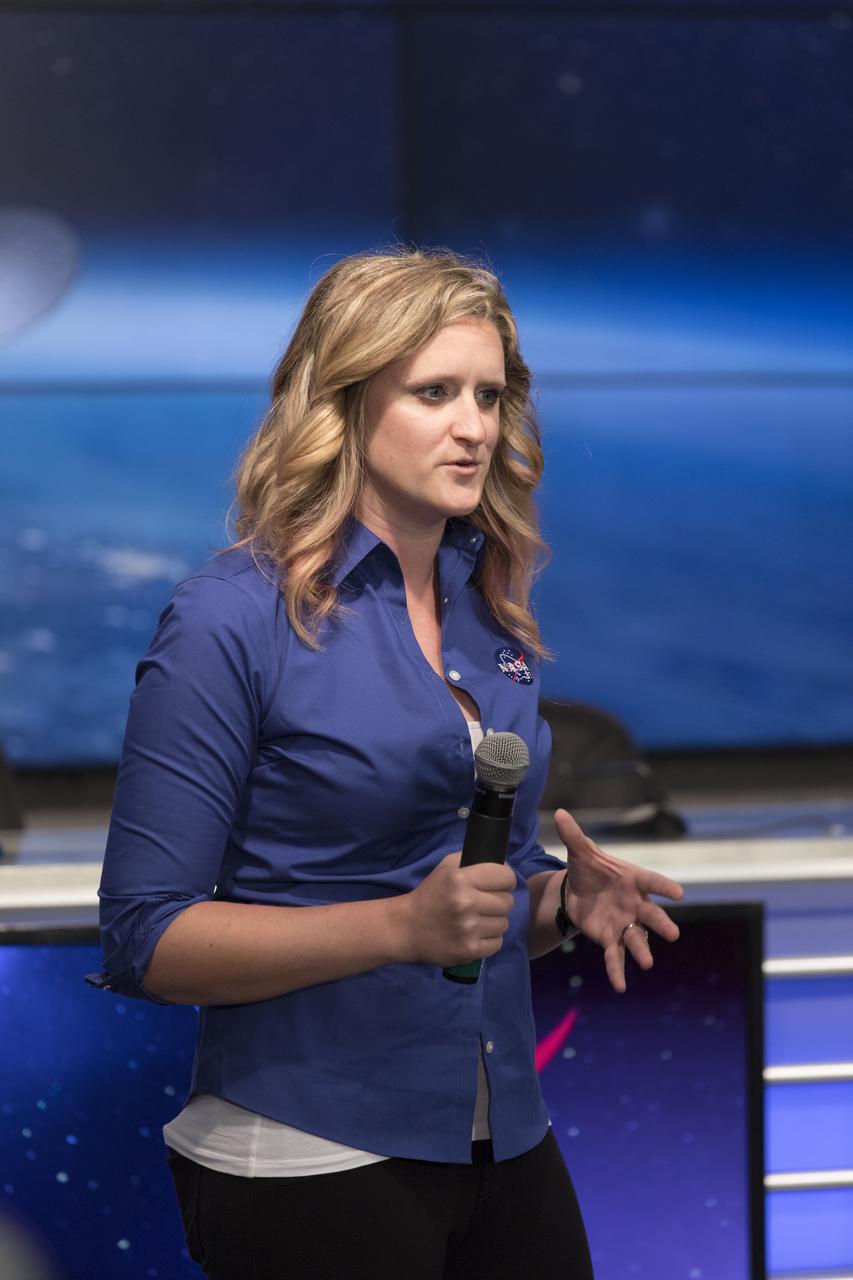 Amber Jacobson of the NASA TDRS Social Media Team speaks to members of social media in the Kennedy Space Center’s Press Site auditorium. The briefing focused on preparations to launch NASA's Tracking and Data Relay Satellite, TDRS-M. The latest spacecraft destined for the agency's constellation of communications satellites, TDRS-M will allow nearly continuous contact with orbiting spacecraft ranging from the International Space Station and Hubble Space Telescope to the array of scientific observatories. Liftoff atop a United Launch Alliance Atlas V rocket is scheduled to take place from Space Launch Complex 41 at Cape Canaveral Air Force Station at 8:03 a.m. EDT Aug. 18.