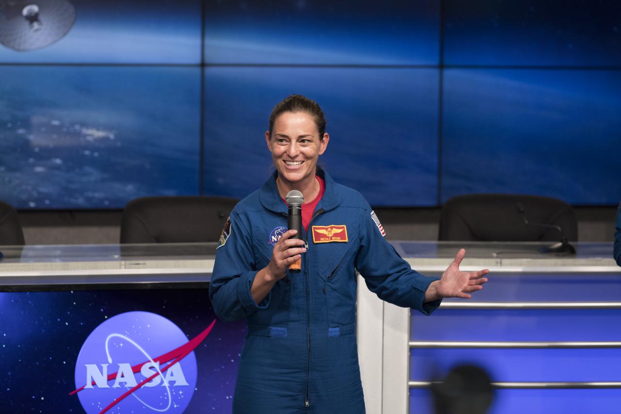 NASA astronaut Nicole Mann speaks to members of social media in the Kennedy Space Center’s Press Site auditorium. The briefing focused on preparations to launch NASA's Tracking and Data Relay Satellite, TDRS-M. The latest spacecraft destined for the agency's constellation of communications satellites, TDRS-M will allow nearly continuous contact with orbiting spacecraft ranging from the International Space Station and Hubble Space Telescope to the array of scientific observatories. Liftoff atop a United Launch Alliance Atlas V rocket is scheduled to take place from Space Launch Complex 41 at Cape Canaveral Air Force Station at 8:03 a.m. EDT Aug. 18.