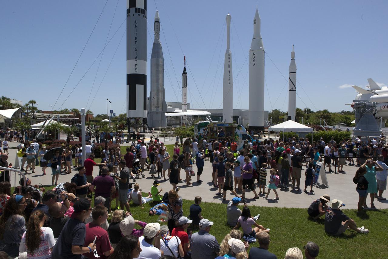 From the Kennedy Space Center Visitor Complex, guests joined Americans from coast to coast following the solar eclipse. Although a partial eclipse on Florida's Space Coast, young and old alike found many ways to watch the rare astronomical event. As the Moon passed between Earth and the midafternoon Sun, a shadow moved across the landscape. The 70-mile-wide totality path, or "umbral cone" -- where the entire Sun will vanish behind the Moon -- stretched across 14 states, from Oregon to South Carolina.