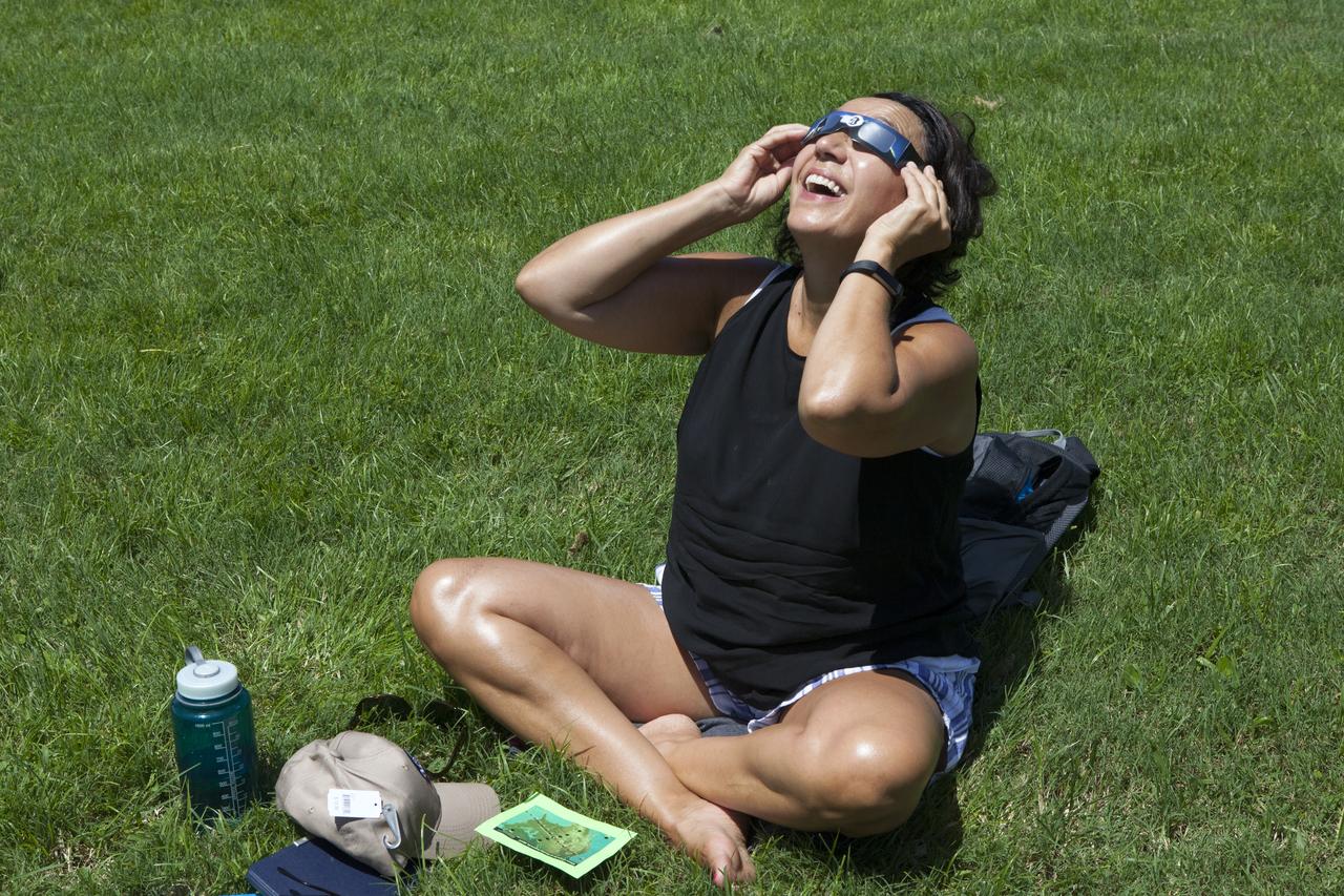 From the Kennedy Space Center Visitor Complex, guests joined Americans from coast to coast following the solar eclipse. Although a partial eclipse on Florida's Space Coast, young and old alike found many ways to watch the rare astronomical event. As the Moon passed between Earth and the midafternoon Sun, a shadow moved across the landscape. The 70-mile-wide totality path, or "umbral cone" -- where the entire Sun will vanish behind the Moon -- stretched across 14 states, from Oregon to South Carolina.