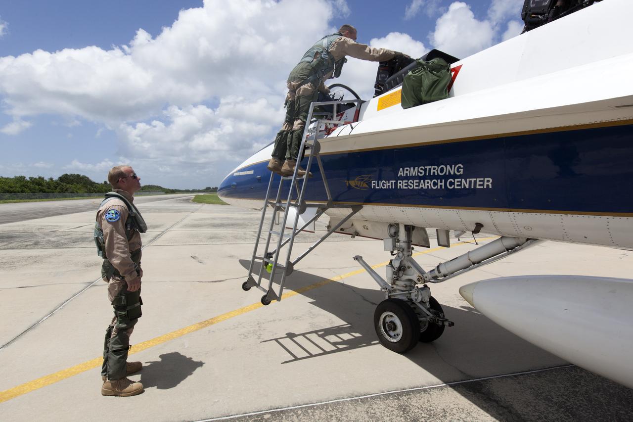 NASA pilots board an F-18 jet prior to take off from the agency's Shuttle Landing Facility at NASA's Kennedy Space Center in Florida. Several flights a day have been taking place the week of Aug. 21, 2017 to measure the effects of sonic booms. It is part of NASA's Sonic Booms in Atmospheric Turbulence, or SonicBAT II Program. NASA at Kennedy is partnering with the agency's Armstrong Flight Research Center in California, Langley Research Center in Virginia, and Space Florida for a program in which F-18 jets will take off from the Shuttle Landing Facility and fly at supersonic speeds while agency researchers measure the effects of low-altitude turbulence caused by sonic booms.