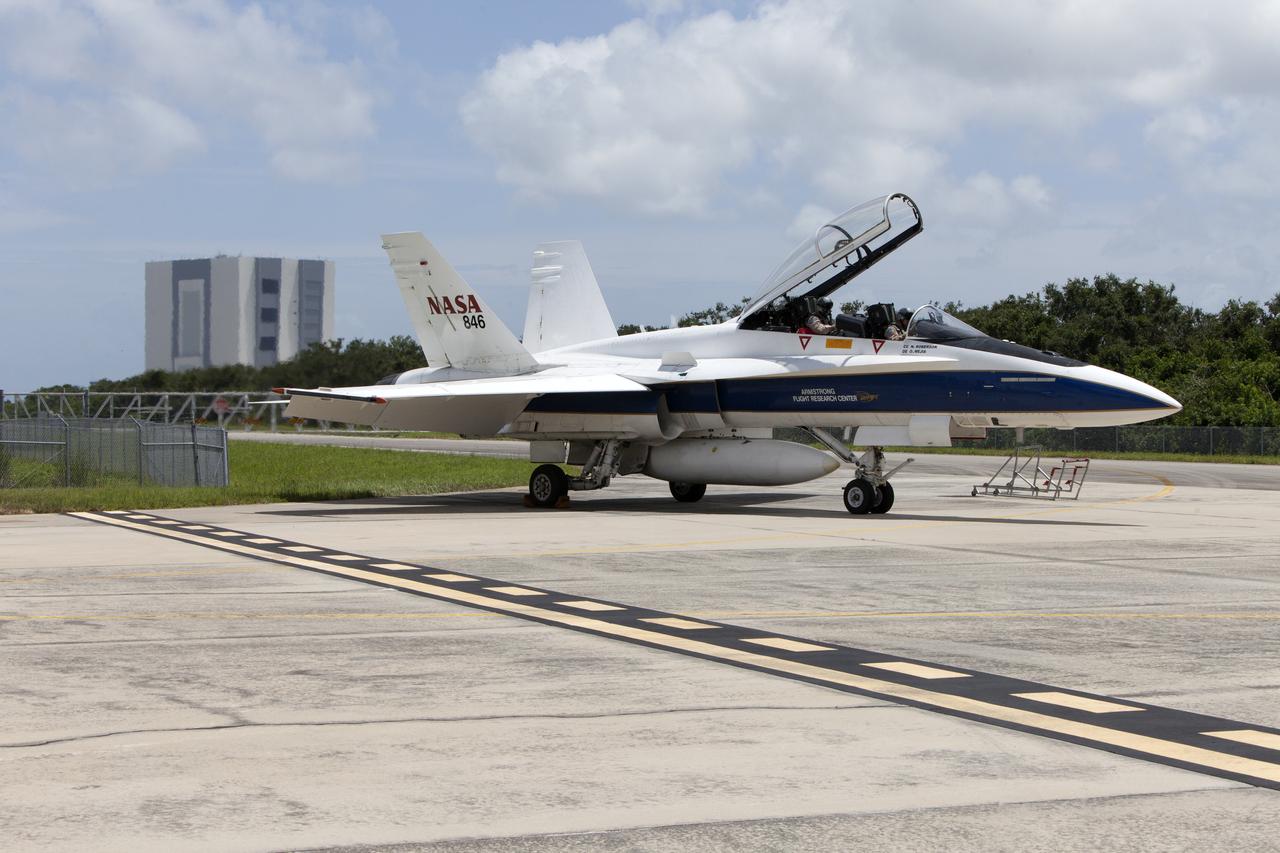 A NASA F-18 jet is prepared for takeoff from the agency's Shuttle Landing Facility at NASA's Kennedy Space Center in Florida. Several flights a day have been taking place the week of Aug. 21, 2017 to measure the effects of sonic booms. It is part of NASA's Sonic Booms in Atmospheric Turbulence, or SonicBAT II Program. NASA at Kennedy is partnering with the agency's Armstrong Flight Research Center in California, Langley Research Center in Virginia, and Space Florida for a program in which F-18 jets will take off from the Shuttle Landing Facility and fly at supersonic speeds while agency researchers measure the effects of low-altitude turbulence caused by sonic booms.