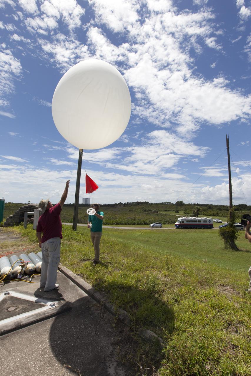 A weather balloon is released at NASA's Kennedy Space Center in Florida before flights of agency F-18 jets to measure the effects of sonic booms. Several flights a day have been taking place the week of Aug. 21, 2017 as part of NASA's Sonic Booms in Atmospheric Turbulence, or SonicBAT II Program. NASA at Kennedy is partnering with the agency's Armstrong Flight Research Center in California, Langley Research Center in Virginia, and Space Florida for a program in which F-18 jets will take off from the Shuttle Landing Facility and fly at supersonic speeds while agency researchers measure the effects of low-altitude turbulence caused by sonic booms.