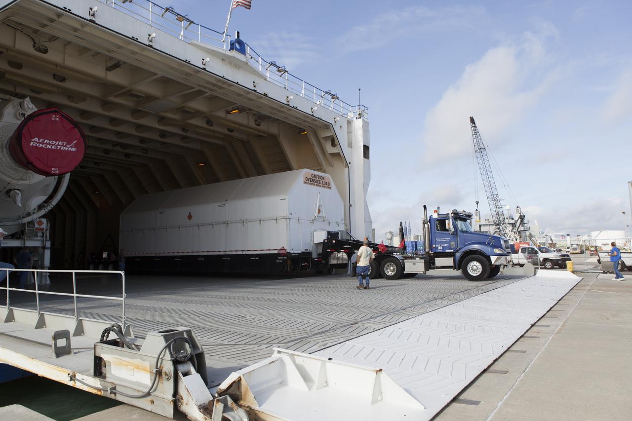 A United Launch Alliance Delta IV Heavy second stage, packaged in its shipping container, is offloaded from the company's Mariner ship at Port Canaveral in Florida. The Delta IV Heavy will launch NASA's upcoming Parker Solar Probe mission. The mission will perform the closest-ever observations of a star when it travels through the Sun's atmosphere, called the corona. The probe will rely on measurements and imaging to revolutionize our understanding of the corona and the Sun-Earth connection. Liftoff atop the Delta IV Heavy rocket is scheduled to take place from Cape Canaveral's Space Launch Complex 37 in summer 2018.