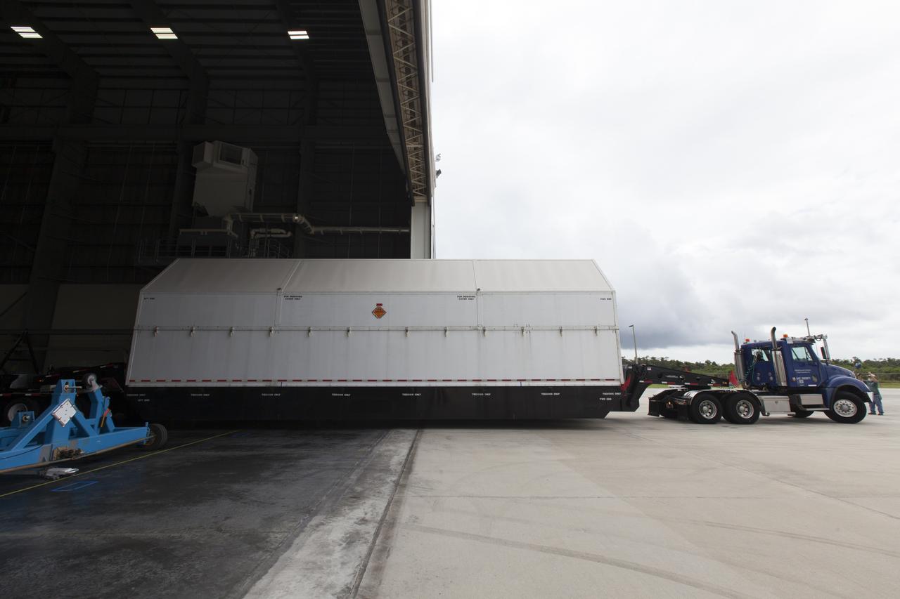 A United Launch Alliance Delta IV Heavy second stage, packaged in its shipping container, arrives at the Horizontal Integration Facility at Cape Canaveral Air Force Station for preflight processing. The Delta IV Heavy will launch NASA's upcoming Parker Solar Probe mission. The mission will perform the closest-ever observations of a star when it travels through the Sun's atmosphere, called the corona. The probe will rely on measurements and imaging to revolutionize our understanding of the corona and the Sun-Earth connection. Liftoff atop the Delta IV Heavy rocket is scheduled to take place from Cape Canaveral's Space Launch Complex 37 in summer 2018.